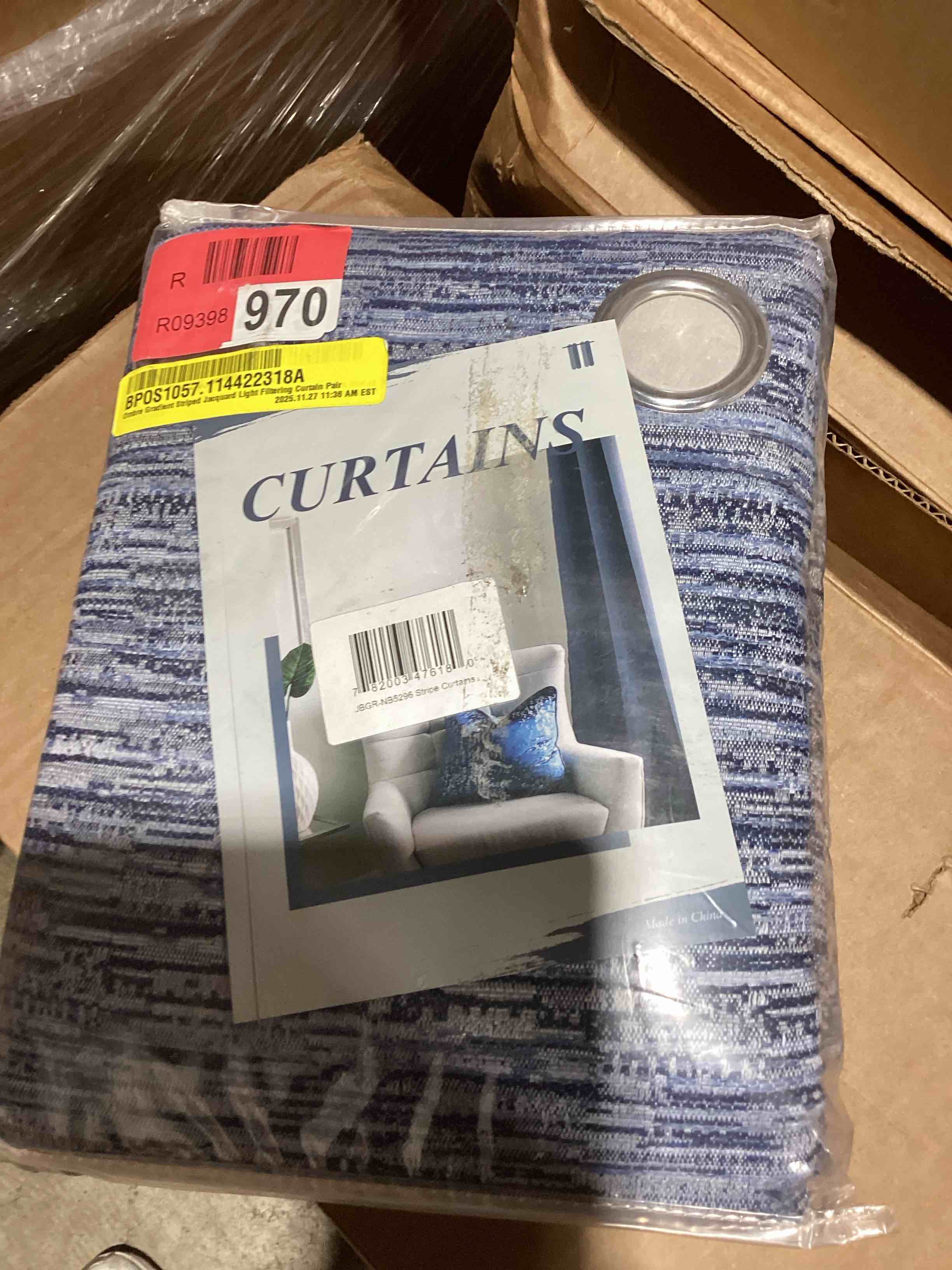Condition photo showing New/Like New for ombre gradient striped jacquard light filtering curtain pair color blue