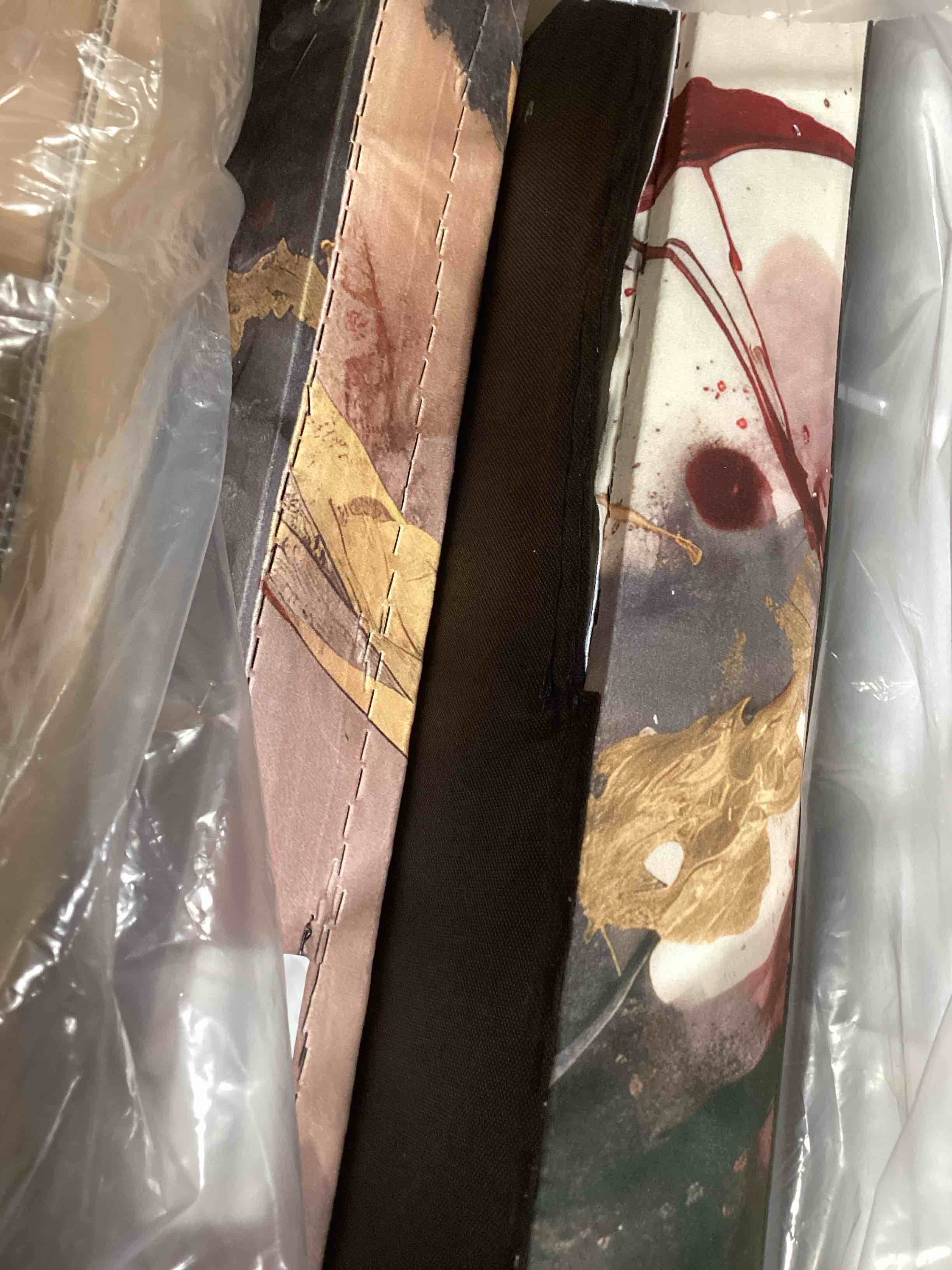 Condition photo showing New/Like New for chair gold and red fluid fusion similar to the photo