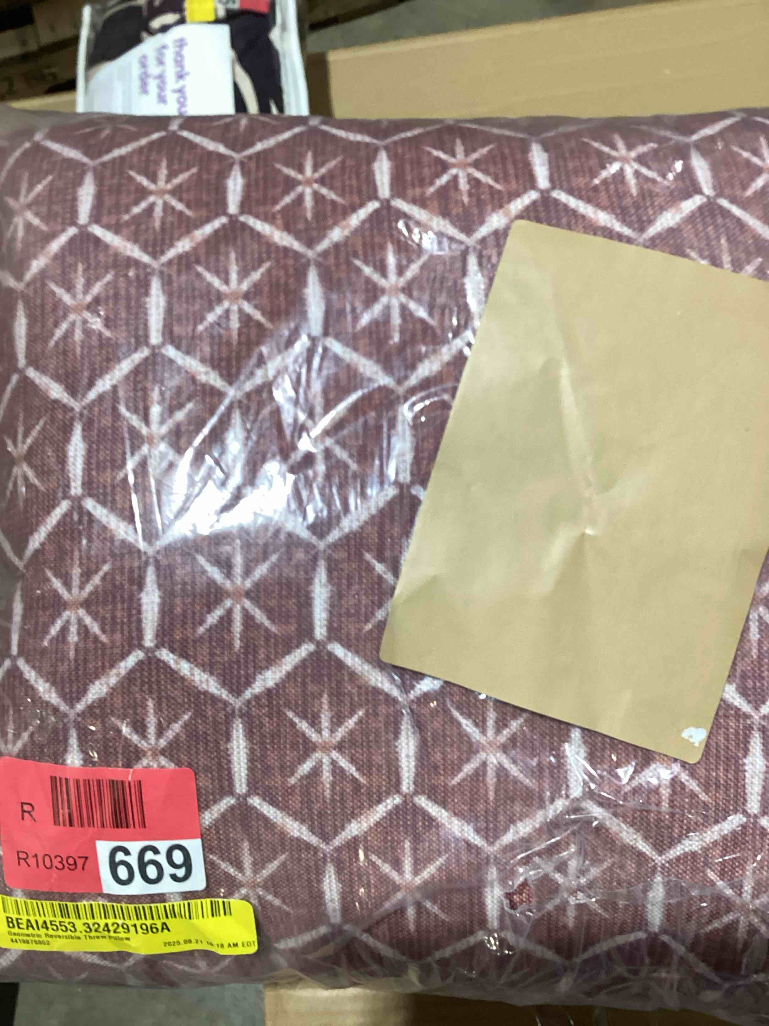 Condition photo showing New/Like New for tufted geometric print pillow