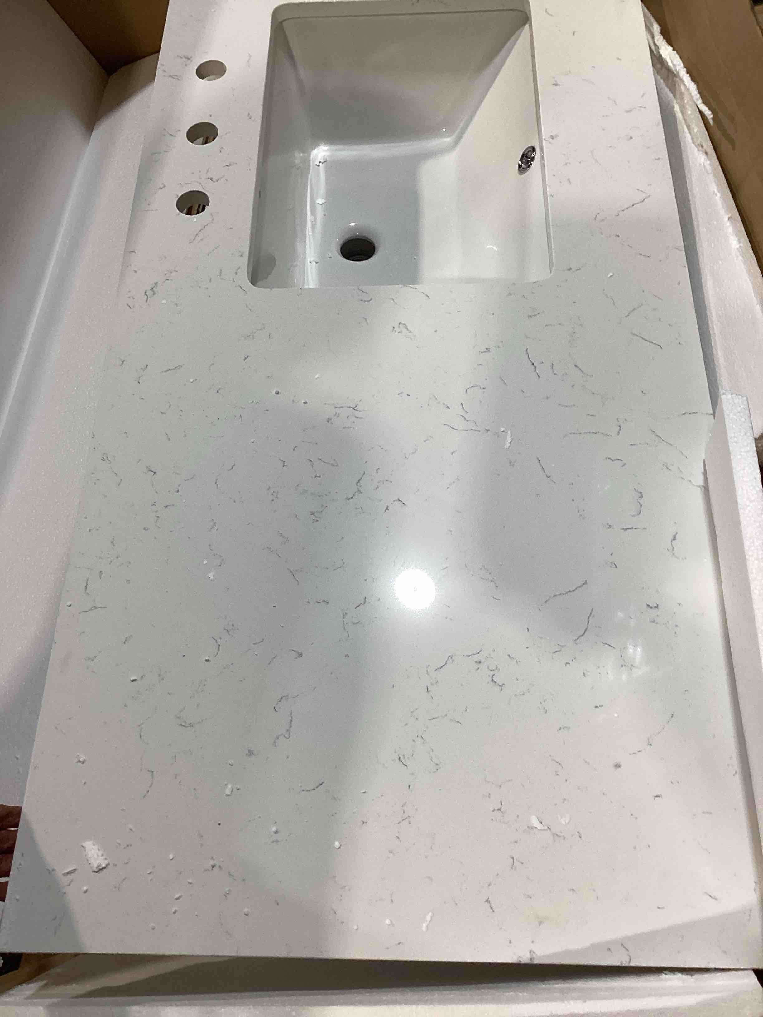 Condition photo showing New/Like New for 52” x 22” carrara quartz vanity top right sink with 3 holes includes backsplash