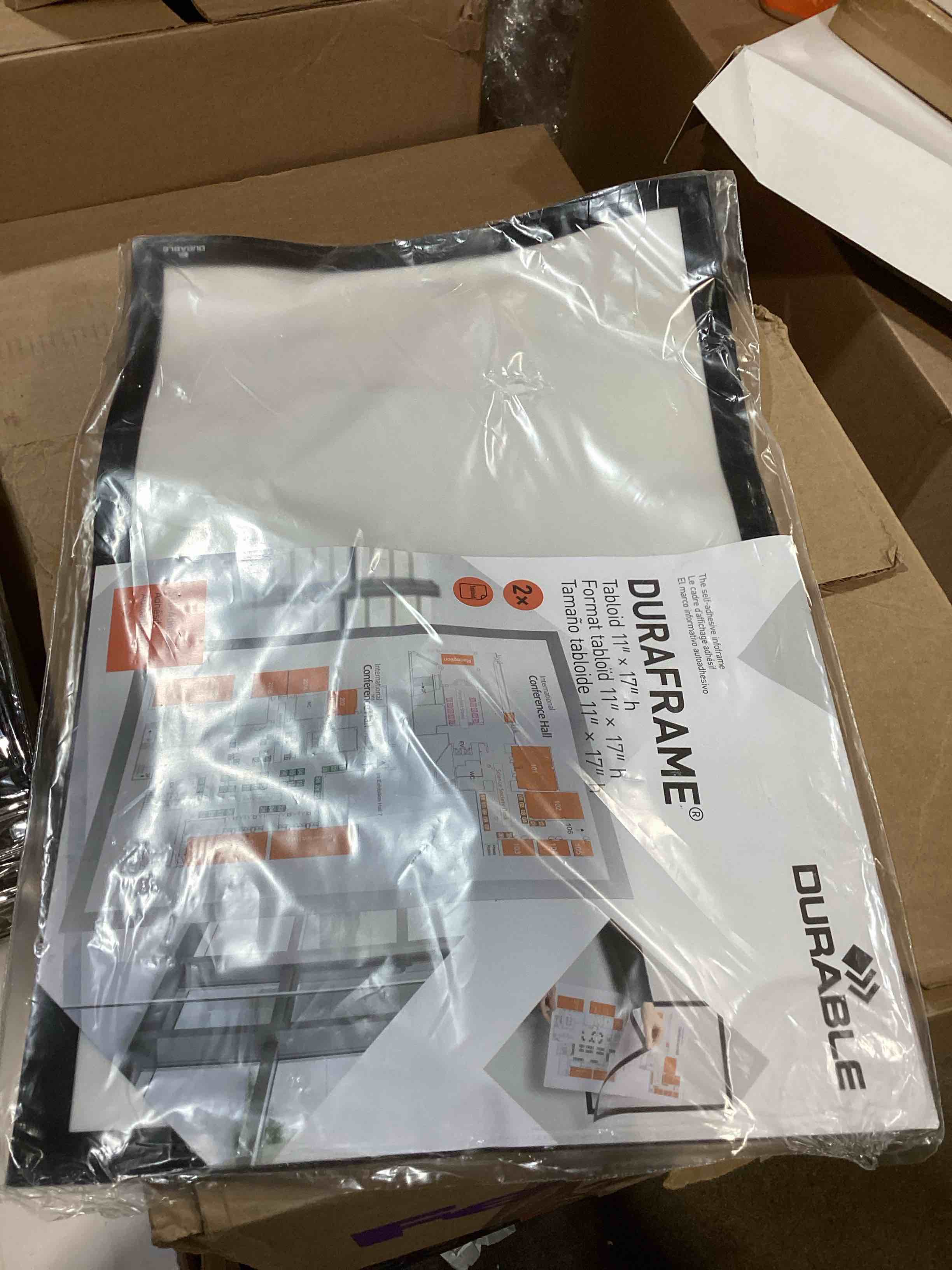 Condition photo showing Good Condition for durable self-adhesive business and store sign holder (476901) black tabloid, 11" x 17"