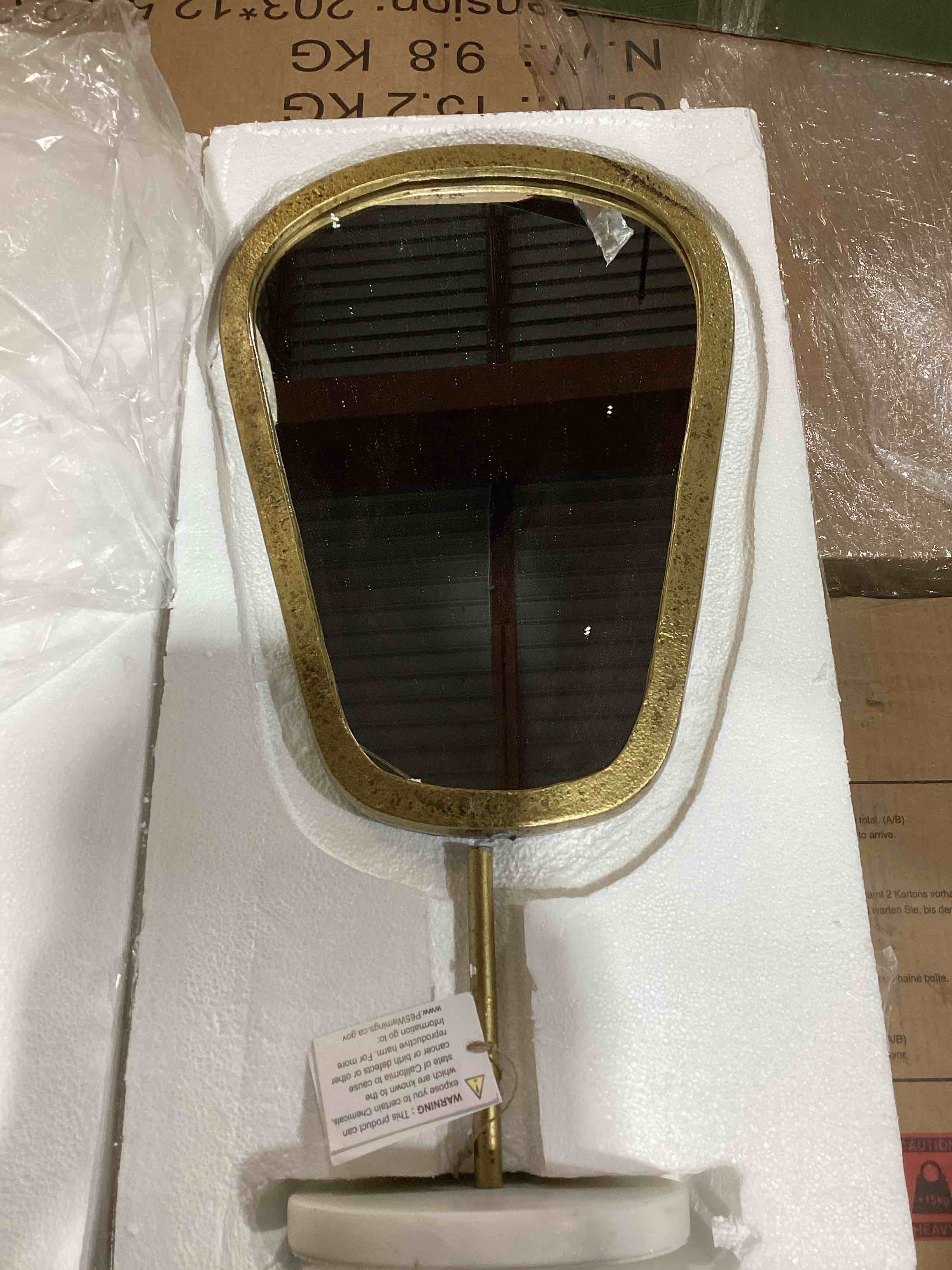 Condition photo showing As Is for micah metal, marble novelty mirror by worlds away size: 19.75" x 9.5"