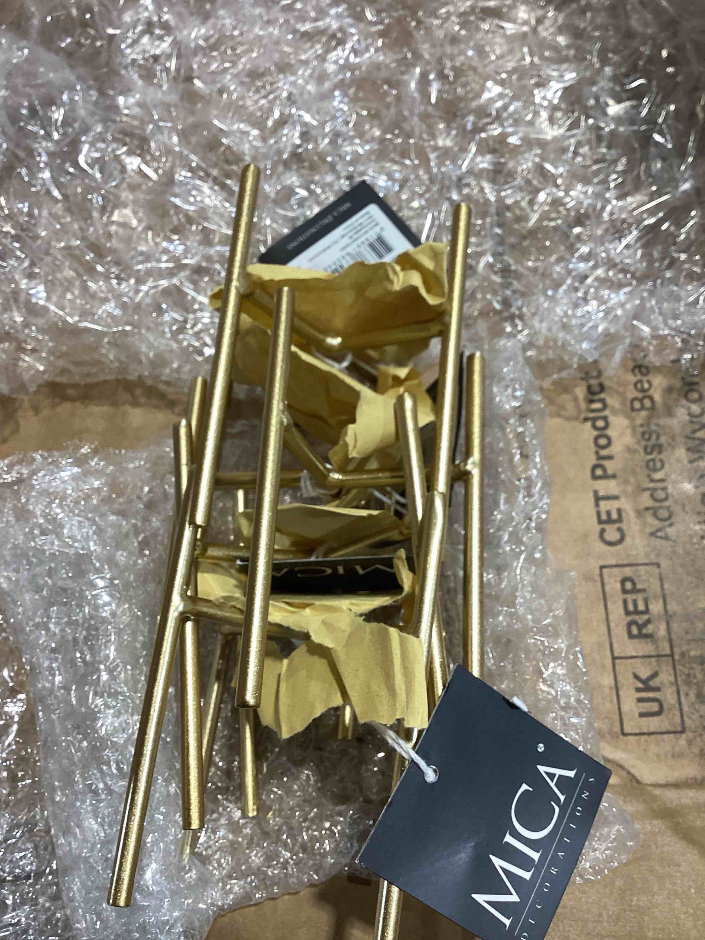 Condition photo showing New/Like New for edmon gold 5  piece metal plant stand