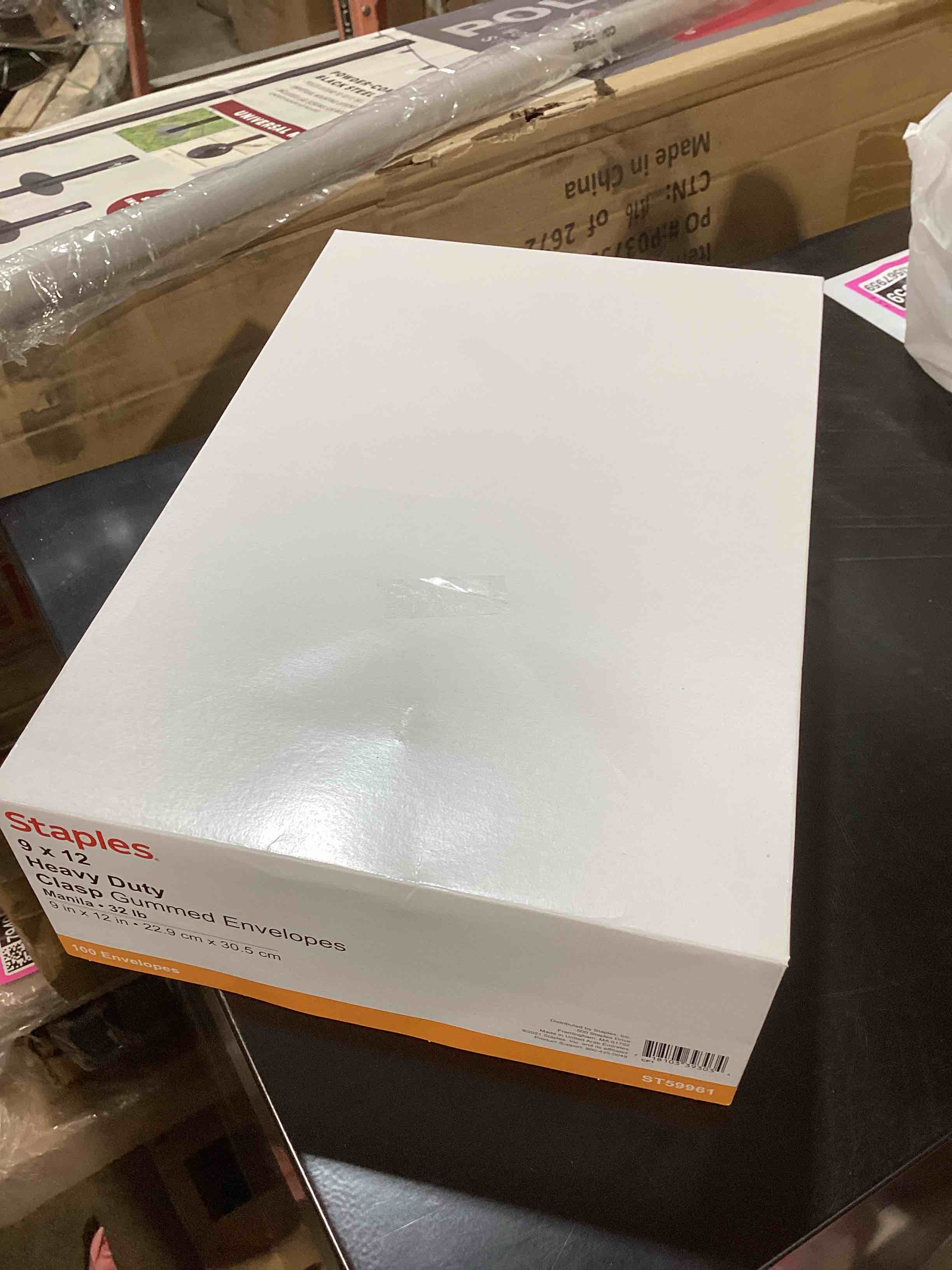 Condition photo showing New/Like New for staples 9 x 12 extra?heavyweight clasp & moistenable envelopes, manila, strong metal clasp for filing & mailing, 100/box