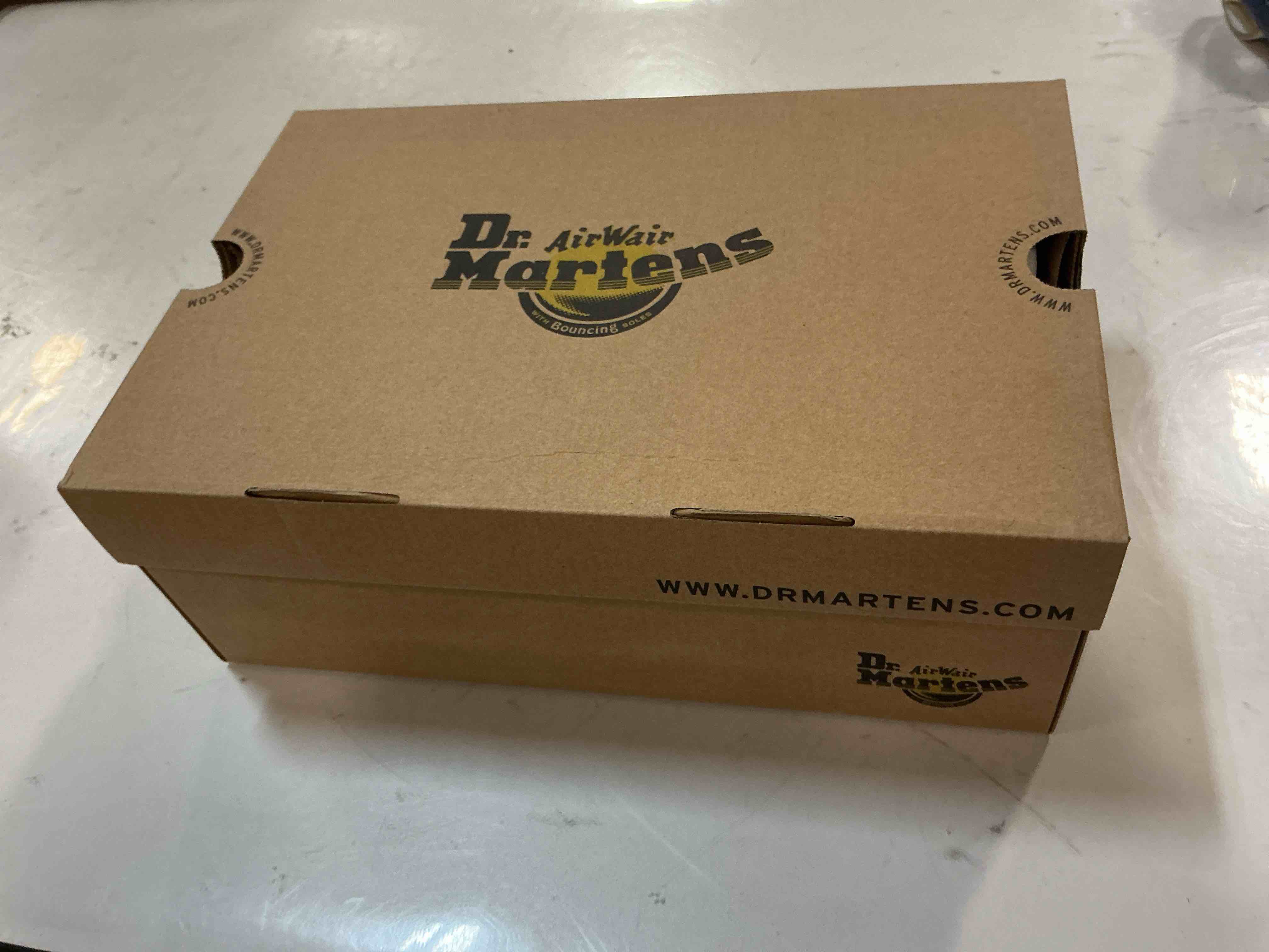Condition photo showing New/Like New for Dr. Martens Unisex-Adult 1460 Mid Calf Boot, Black, Size Men’s 8/ Women’s 9