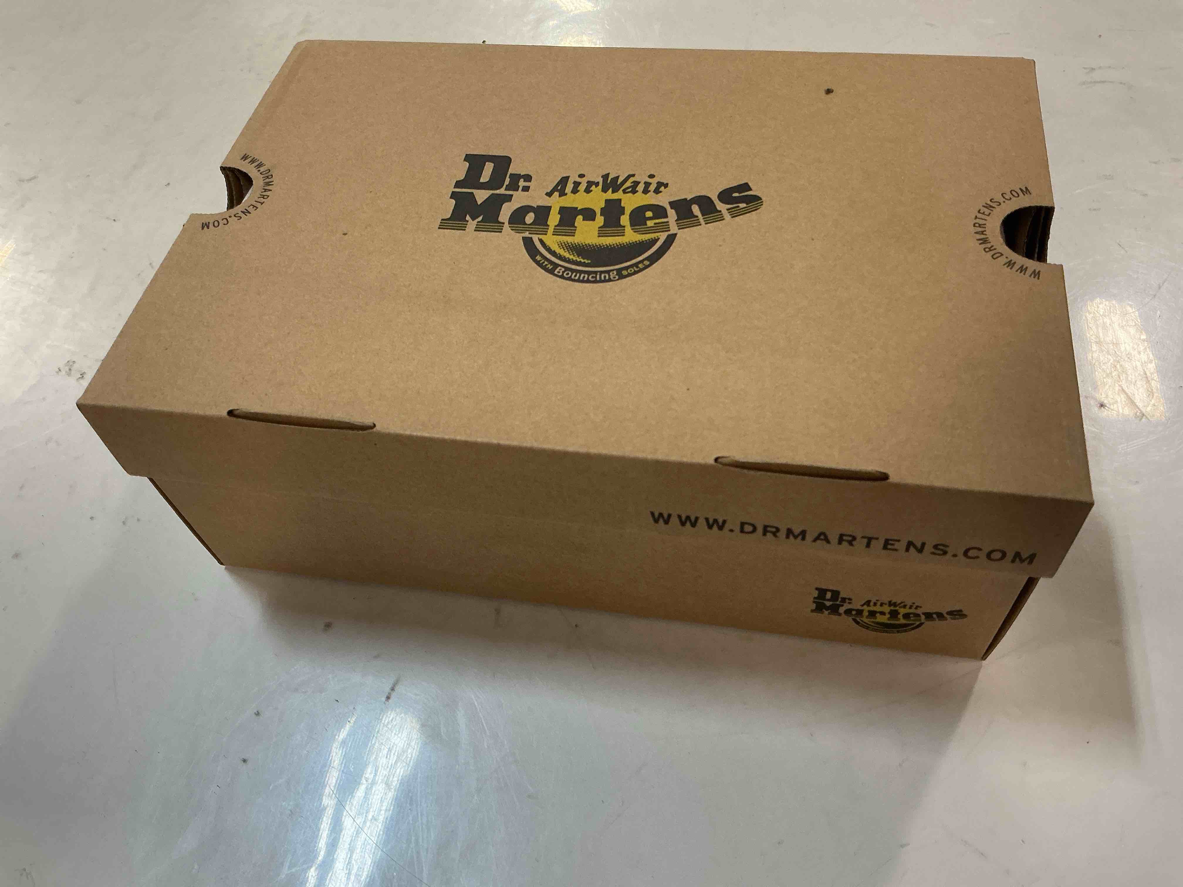 Condition photo showing New/Like New for Dr. Martens '1460' Boot in Black Smooth, Size Men’s 7/ Women’s 8