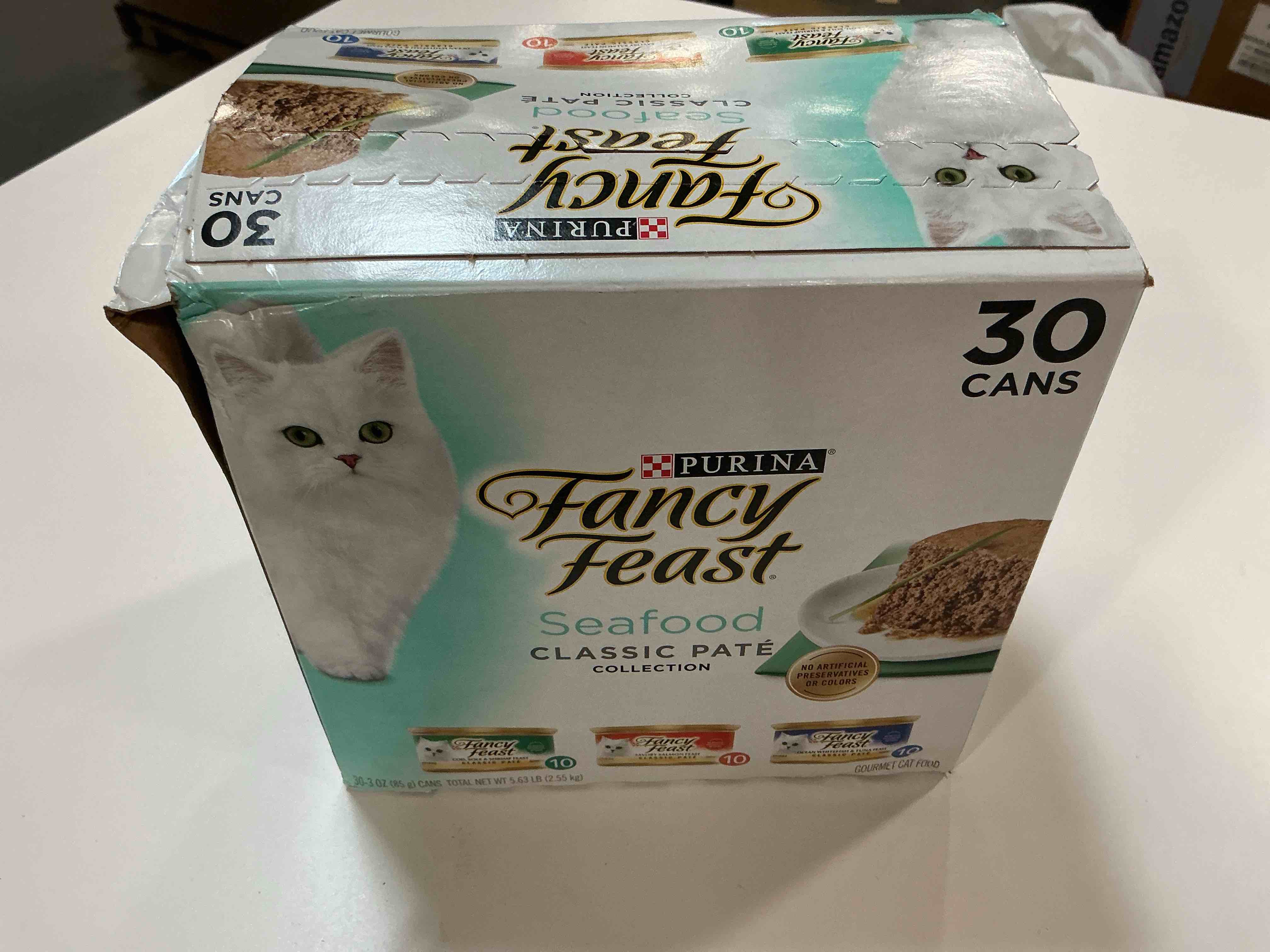 Condition photo showing New/Like New for (best by 4/3027) purina fancy feast seafood classic pate collection grain free wet cat food variety pack - (pack of 30) 3 oz. cans