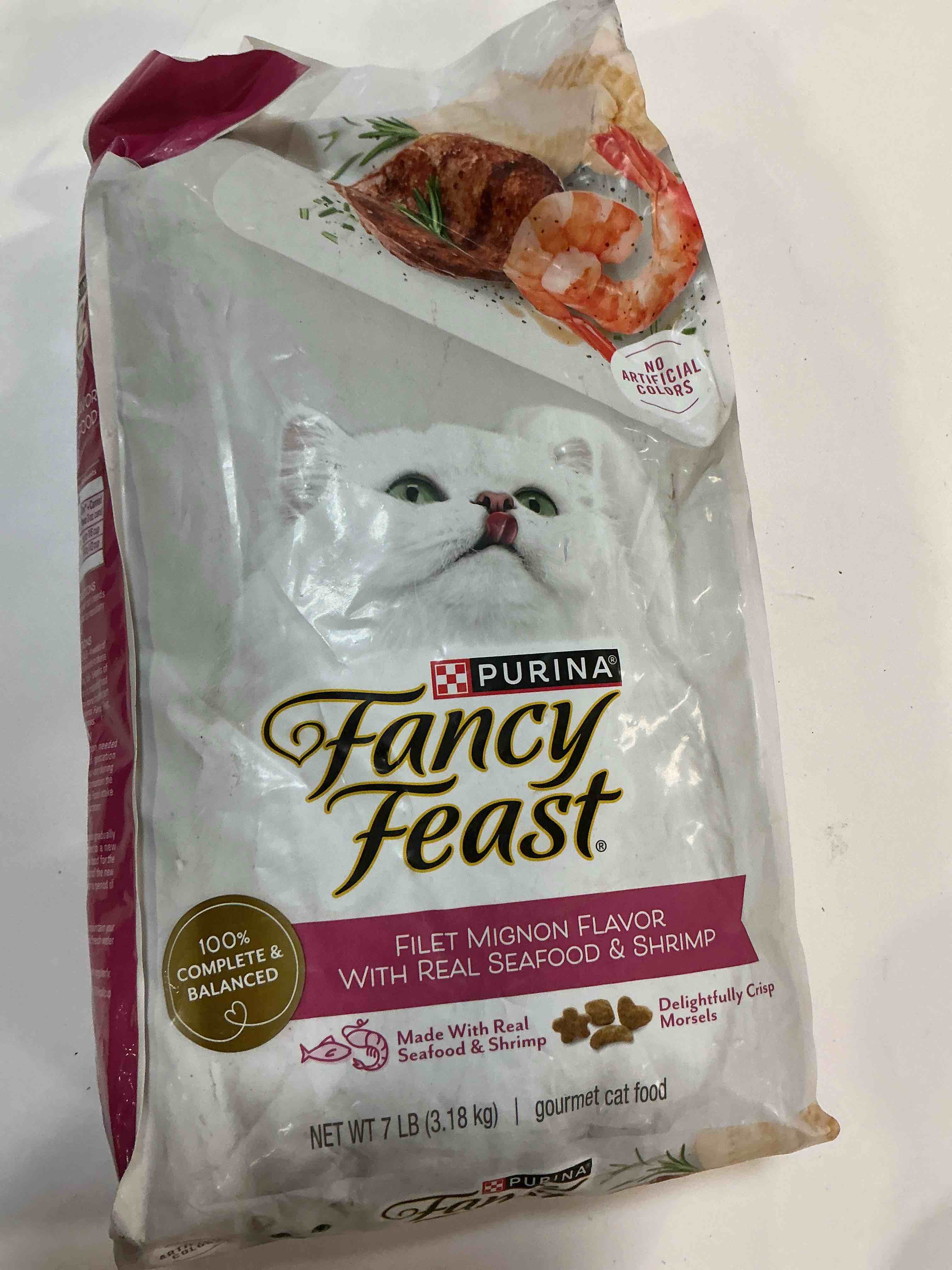Condition photo showing New/Like New for (best by Oct. 2025) Fancy Feast Purina Filet Mignon Flavor with Real Seafood & Shrimp Dry Cat Food (7 Ounce (Pack of 1)) 7 Pound (Pack of 1)
