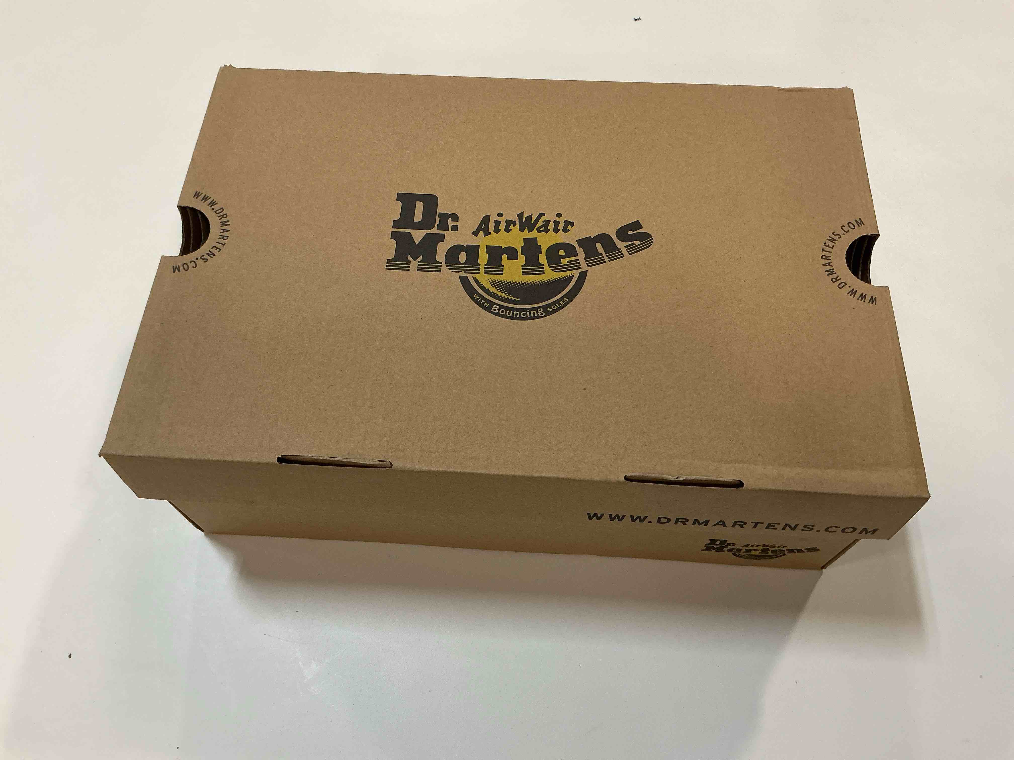 Condition photo showing New/Like New for Dr. Martens 1460 8-Eye Boot Women’s Boots, Black, Size 8