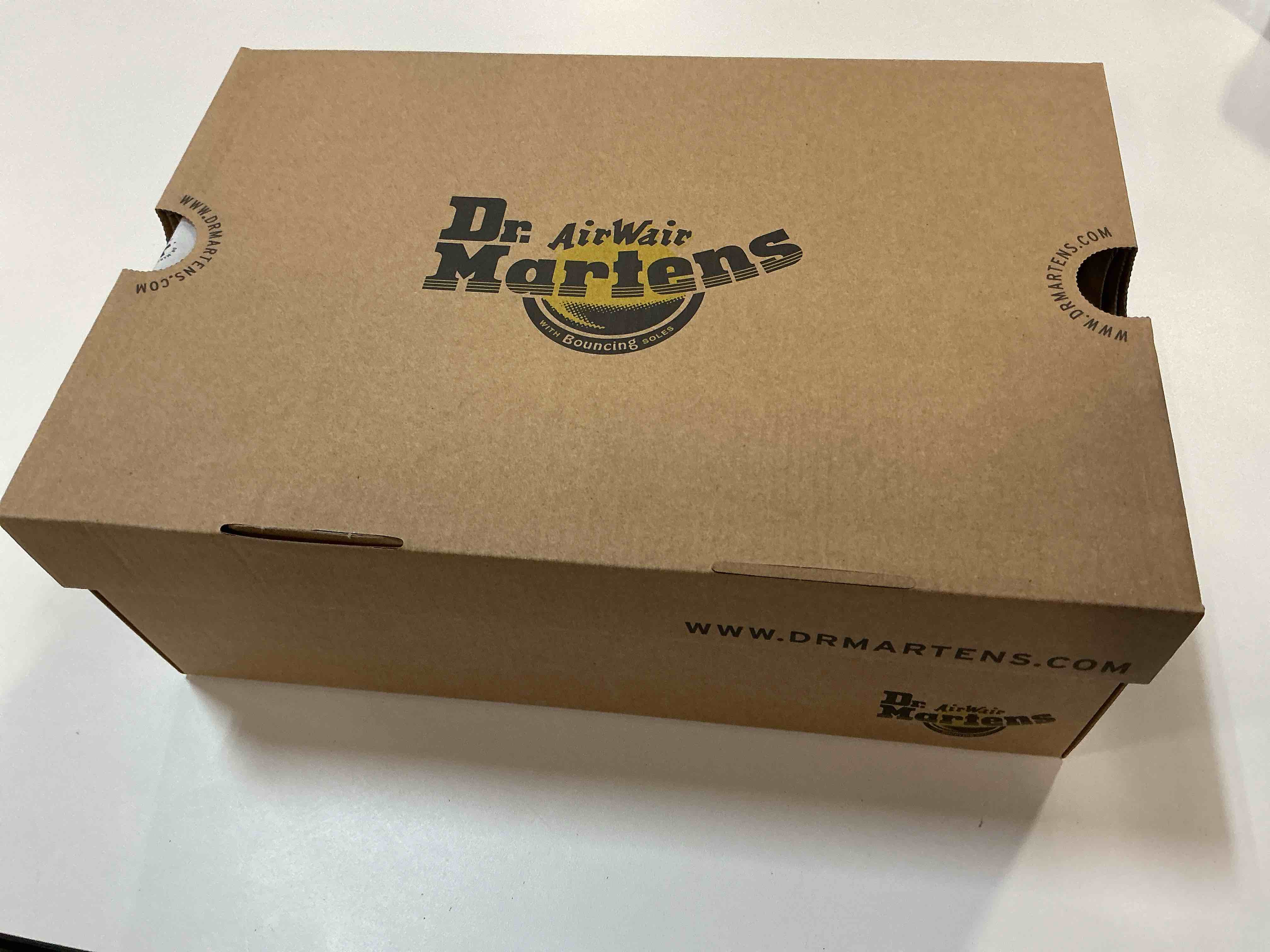 Condition photo showing New/Like New for Dr. Martens Unisex-Adult 1460 Mid Calf Boot, Black, Size Men’s 6/ Women’s 7