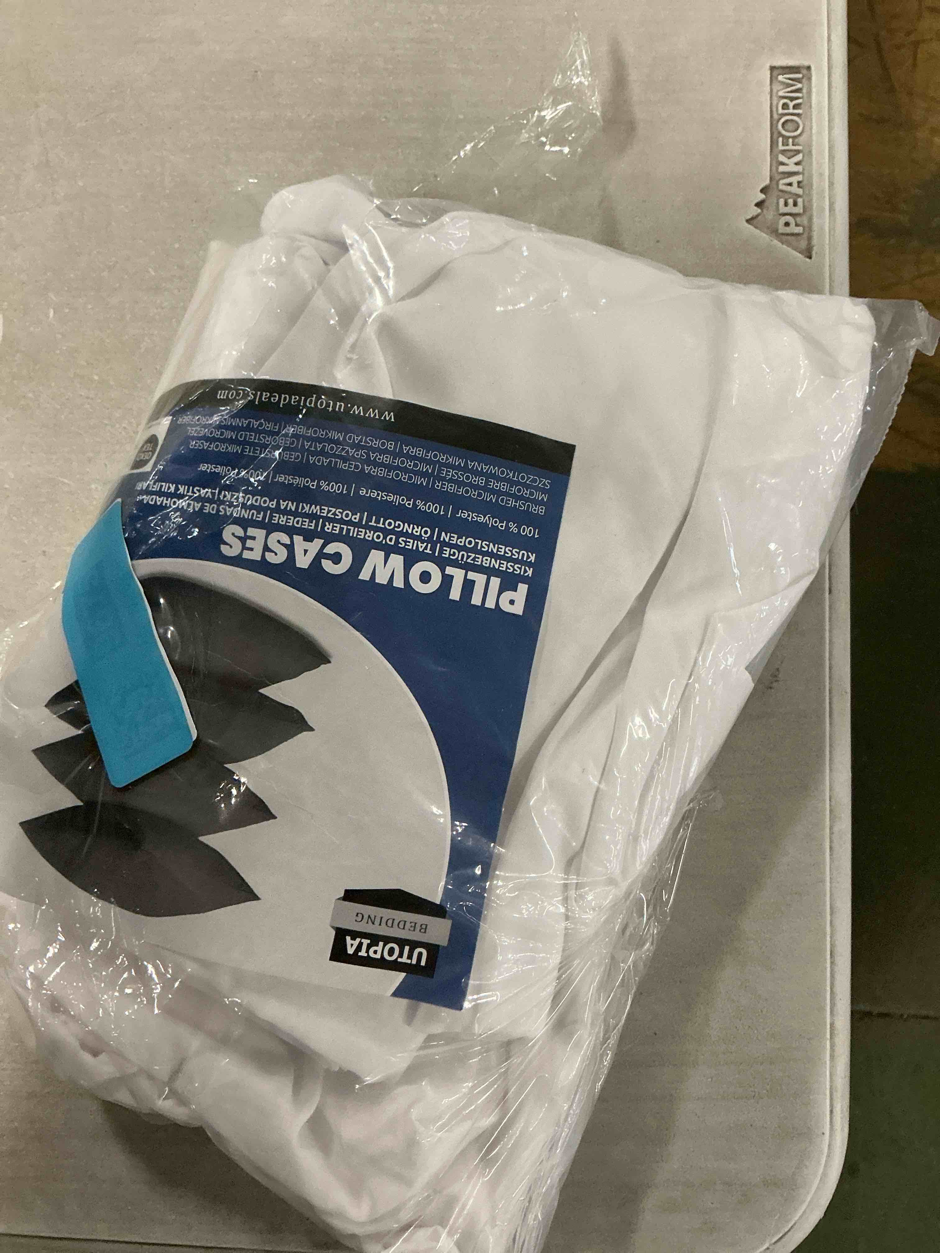 Condition photo showing Good Condition for Utopia Bedding Set of 4 Waterproof Pillow Protectors with Zipper Queen Size (White), Ultra Soft Pillow Covers, Bed Bug and Dust Mite Proof Pillow Encasements, Moisture Wicking Pillow Cases