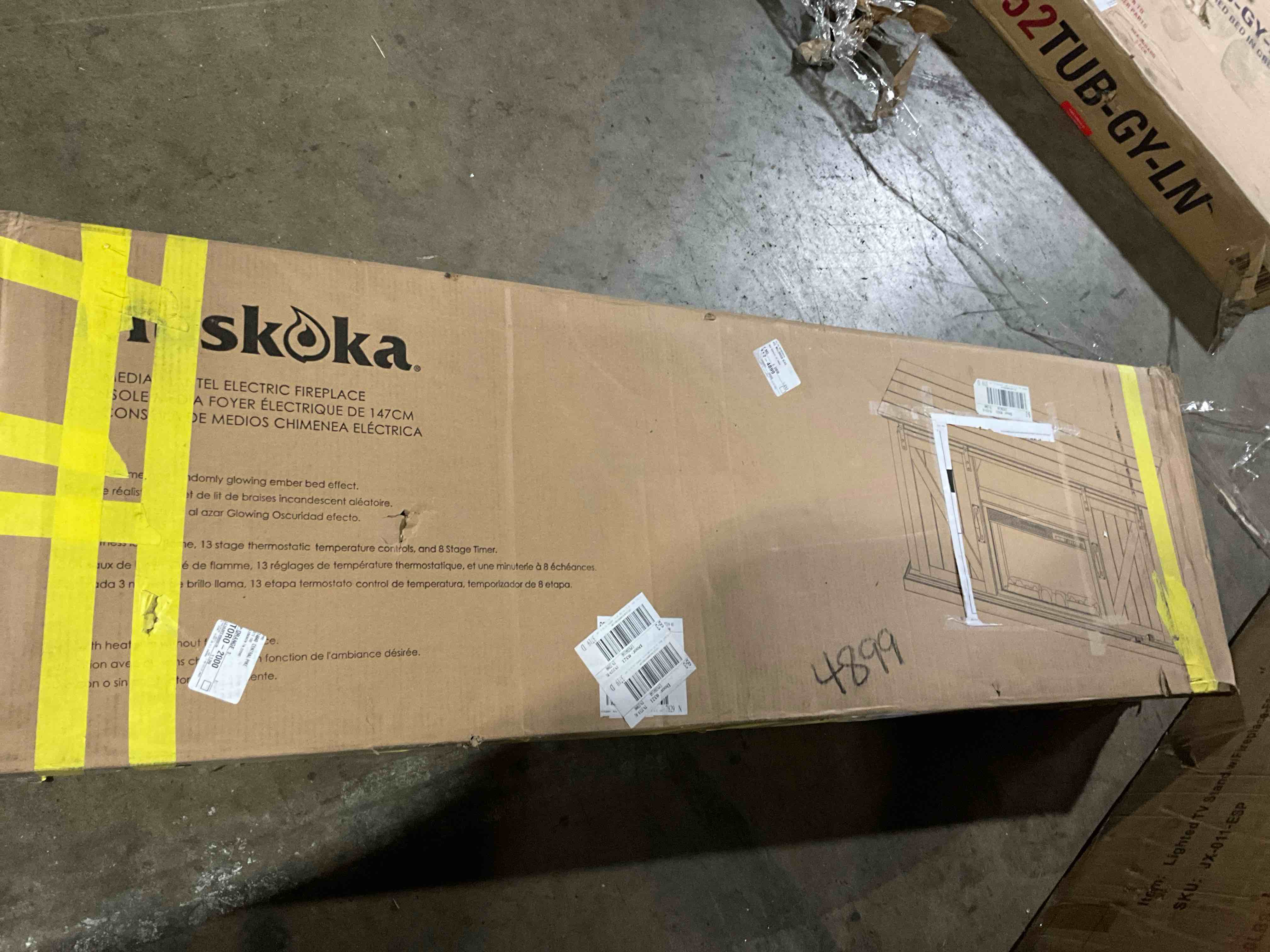 Condition photo showing Good Condition for Muskoka 58-in W Rustic brown TV Stand with Fan-forced Flat Wall Electric Fireplace (insert not included) 