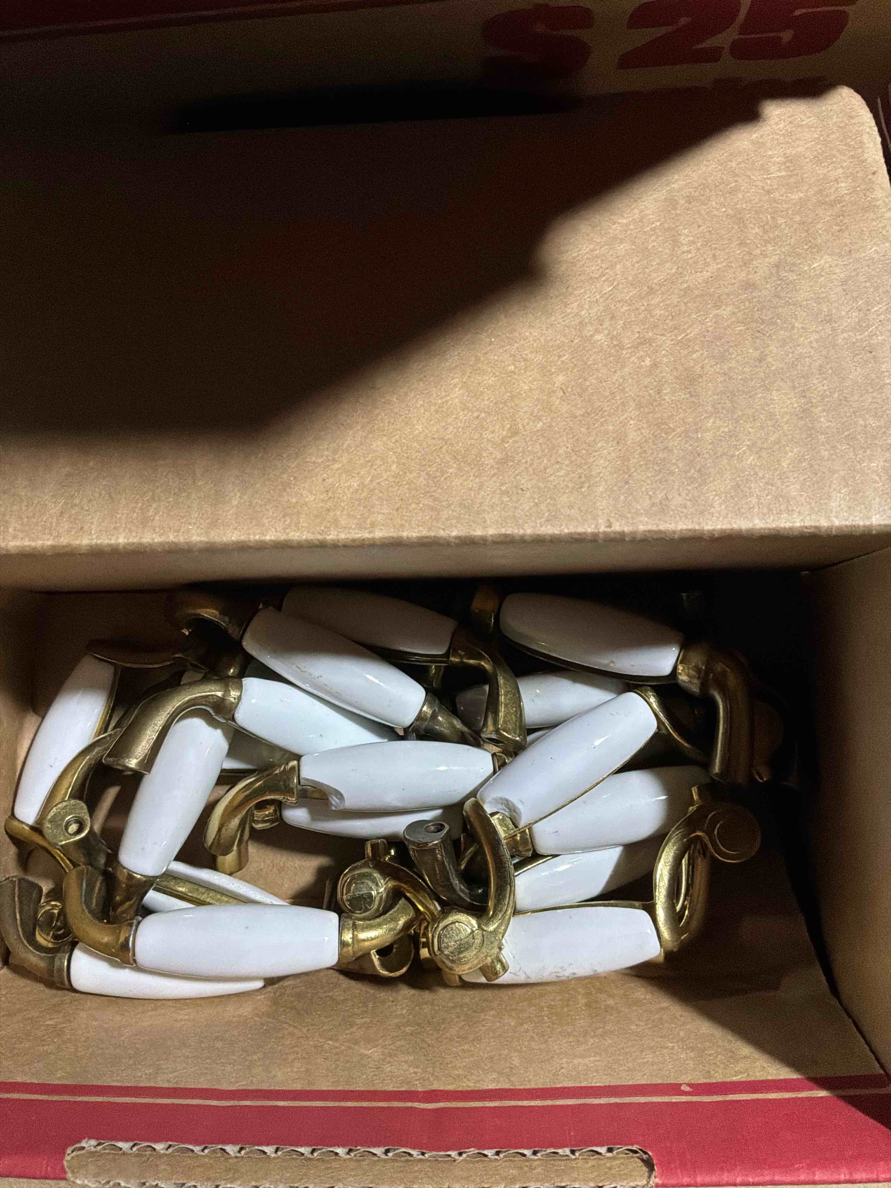 Condition photo showing As Is for pack of 20 drawer pull set 22 used cabinet brass white