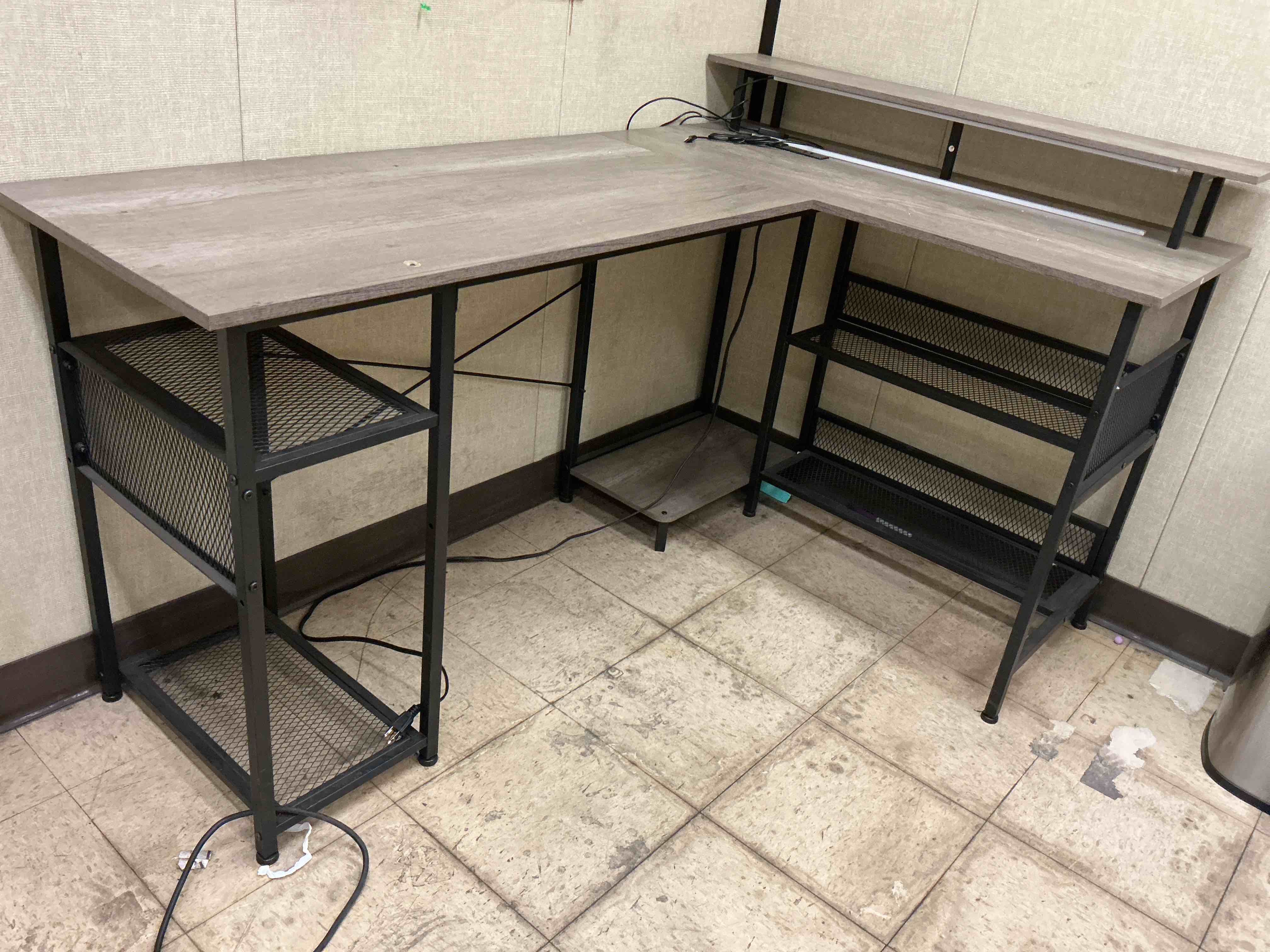 Condition photo showing As Is for 59” L Shaped Desk with Storage, Corner Desk with LED Lights and Power Outlets for Home Office, Small Space, Gray