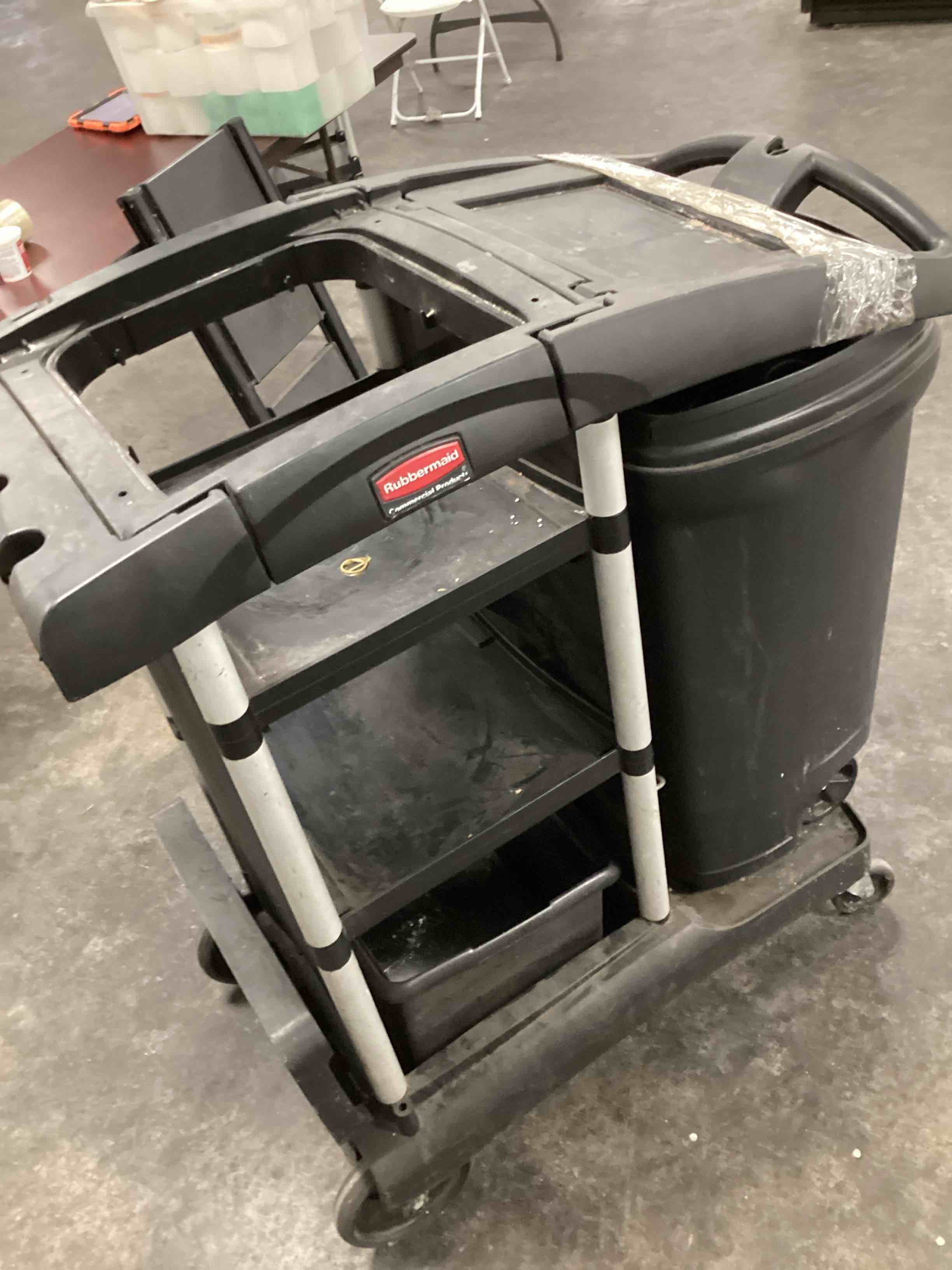 Condition photo showing As Is for Rubbermaid Commercial Traditional Janitorial 3-Shelf Cleaning Cart, Wheeled with Zippered Yellow Vinyl Bag, for Business/School/Office/Janatorial Cleaning Open Sided - Black