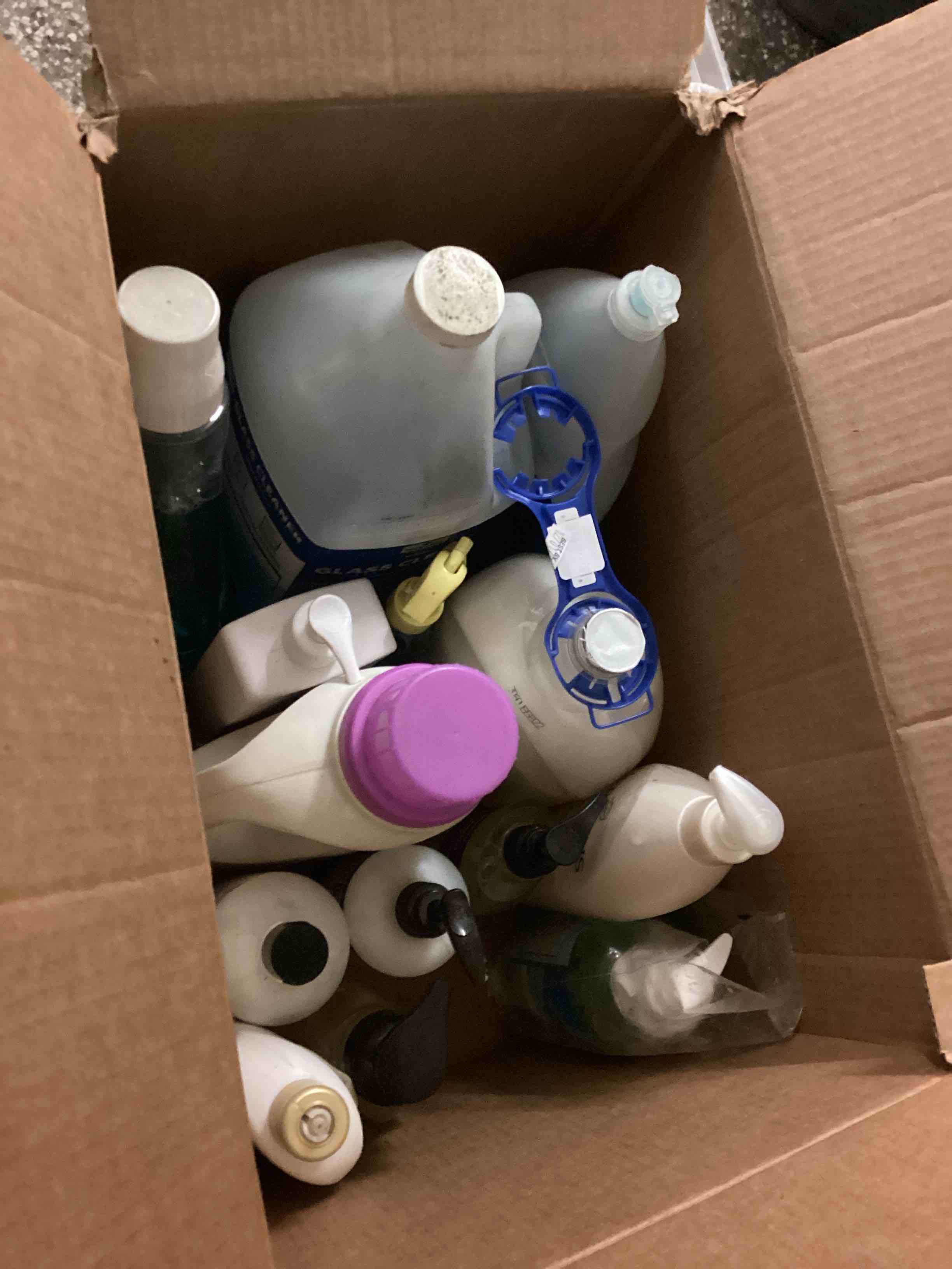 Condition photo showing As Is for Box of Assorted liquid cleaning products and soaps for personal hygiene