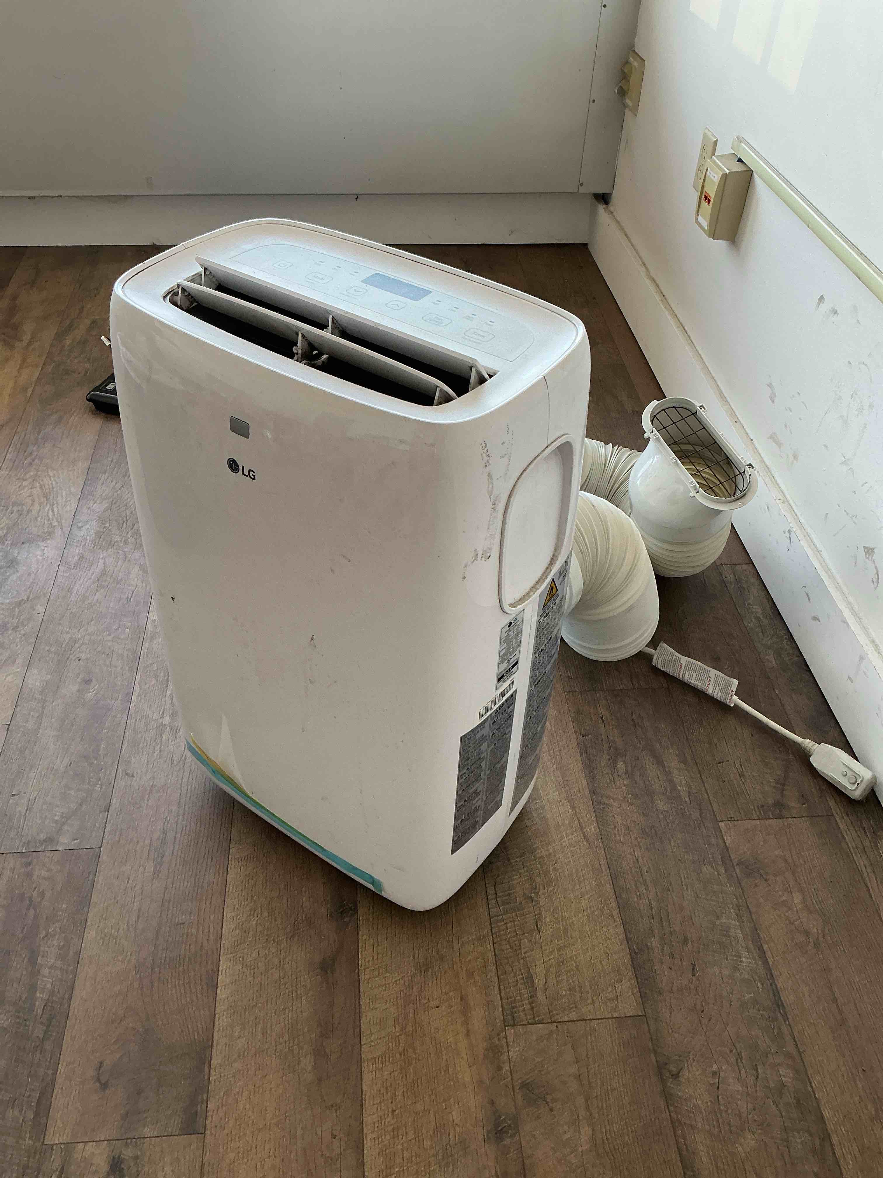 Condition photo showing As Is for LG 6,000 BTU Portable Air Conditioner with Remote, LP0621WSR
