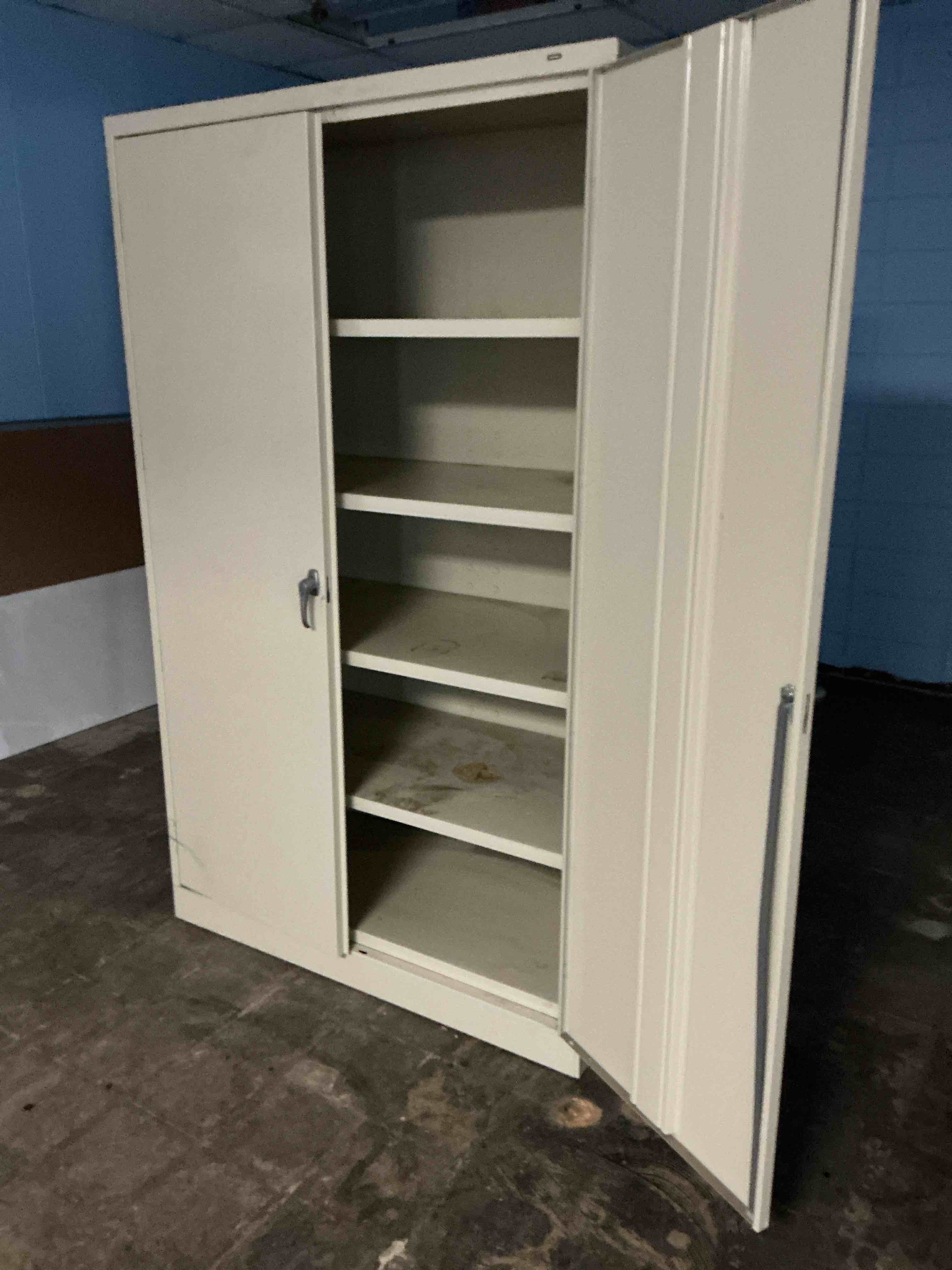 Condition photo showing As Is for Tennsco Light Gray Standard Cabinet - 47" Width x 24" Depth x 72" Height - 5 x Shelf(ves) - 2 x Standard Door(s) - Heavy Duty, Adjustable Shelf, Locking Door, Hinged Door, Reinforced, Carrying Handle, Durable - Light Gray - Powder Coated - Steel