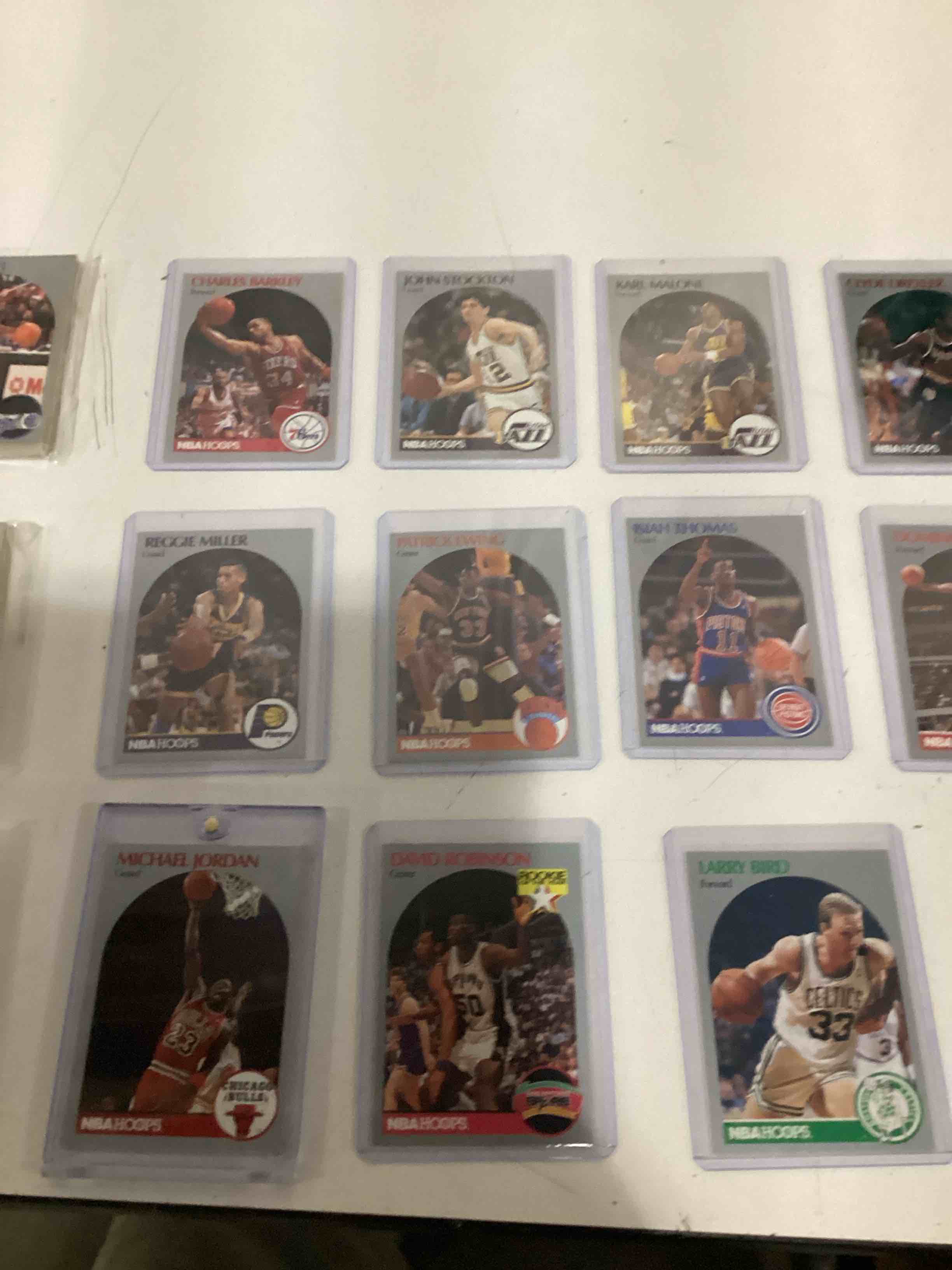 Condition photo showing New/Like New for assorted trading cards. featuring nba and pokémon individual cards and packs