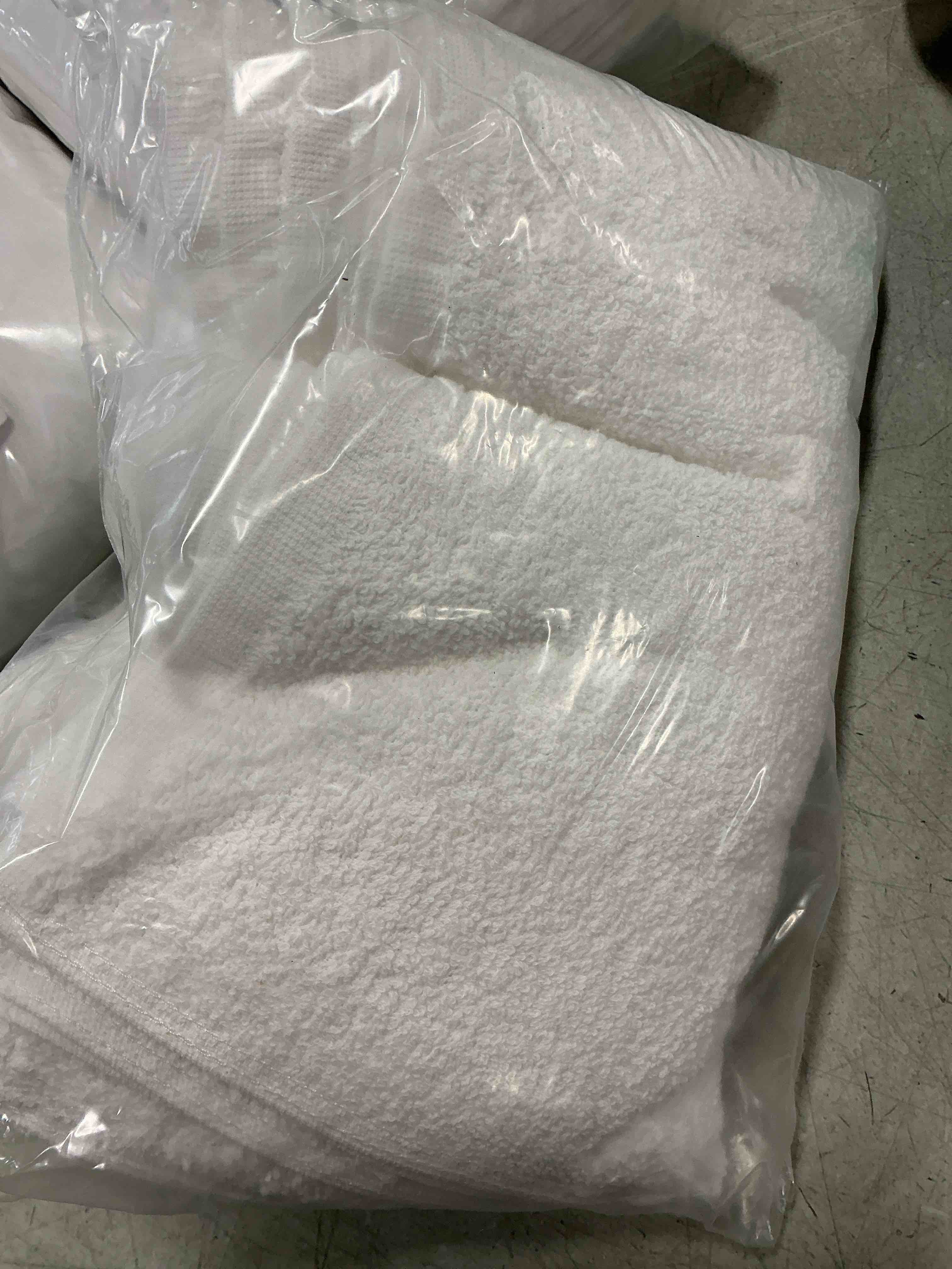 Condition photo showing item condition for Utopia Towels 12 Pack Cotton Washcloths Set, 100% Ring Spun Cotton, Premium Flannel Face Cloths, Highly Absorbent and Soft Feel Fingertip Towels, White