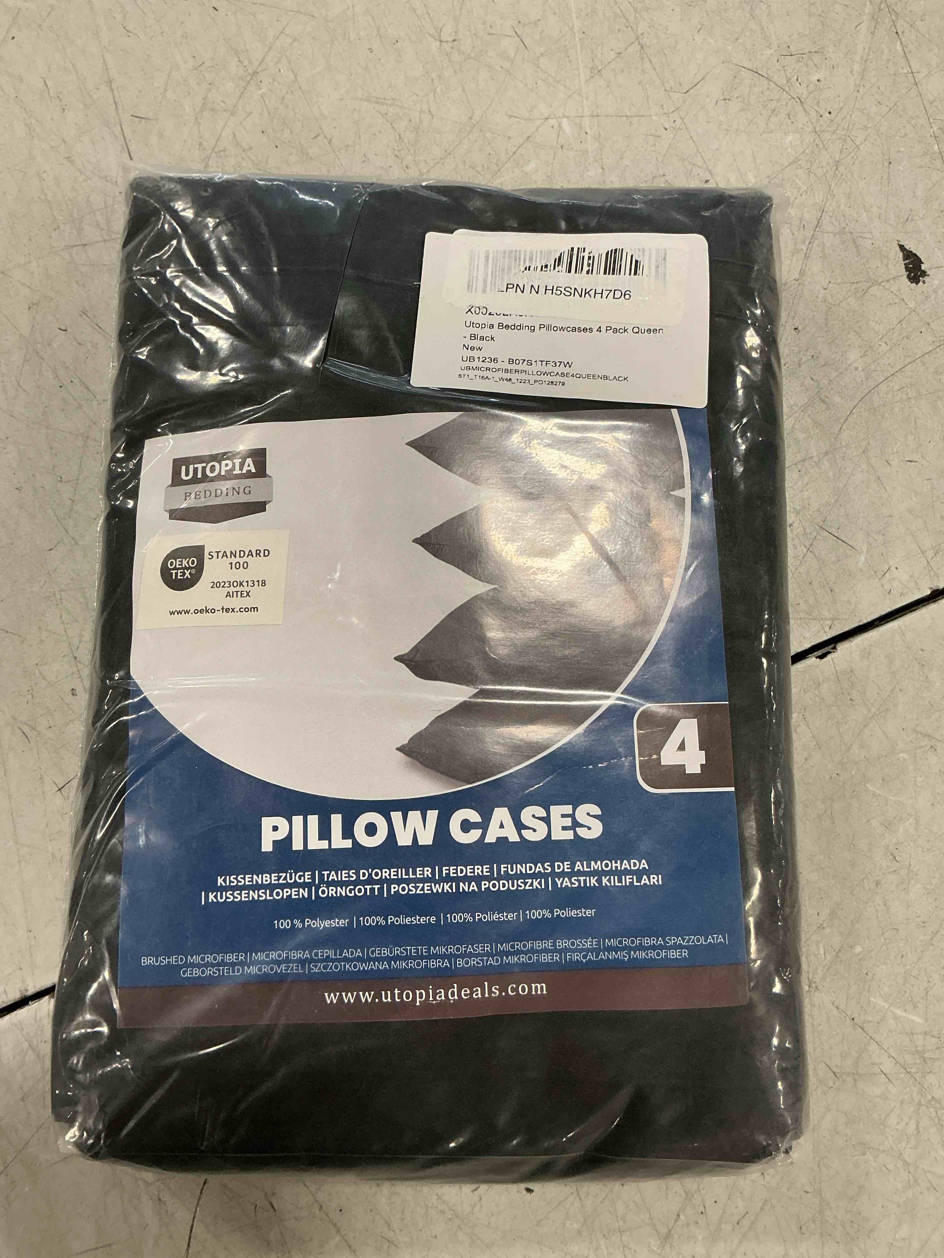Condition photo showing item condition for Utopia Bedding Queen Pillow Cases - Pack of 4 - Envelope Closure - Soft Brushed Microfiber Fabric - Shrinkage and Fade Resistant Pillow Covers Queen Size 20 X 30 Inches (Black) Queen - Pack of 4 Black