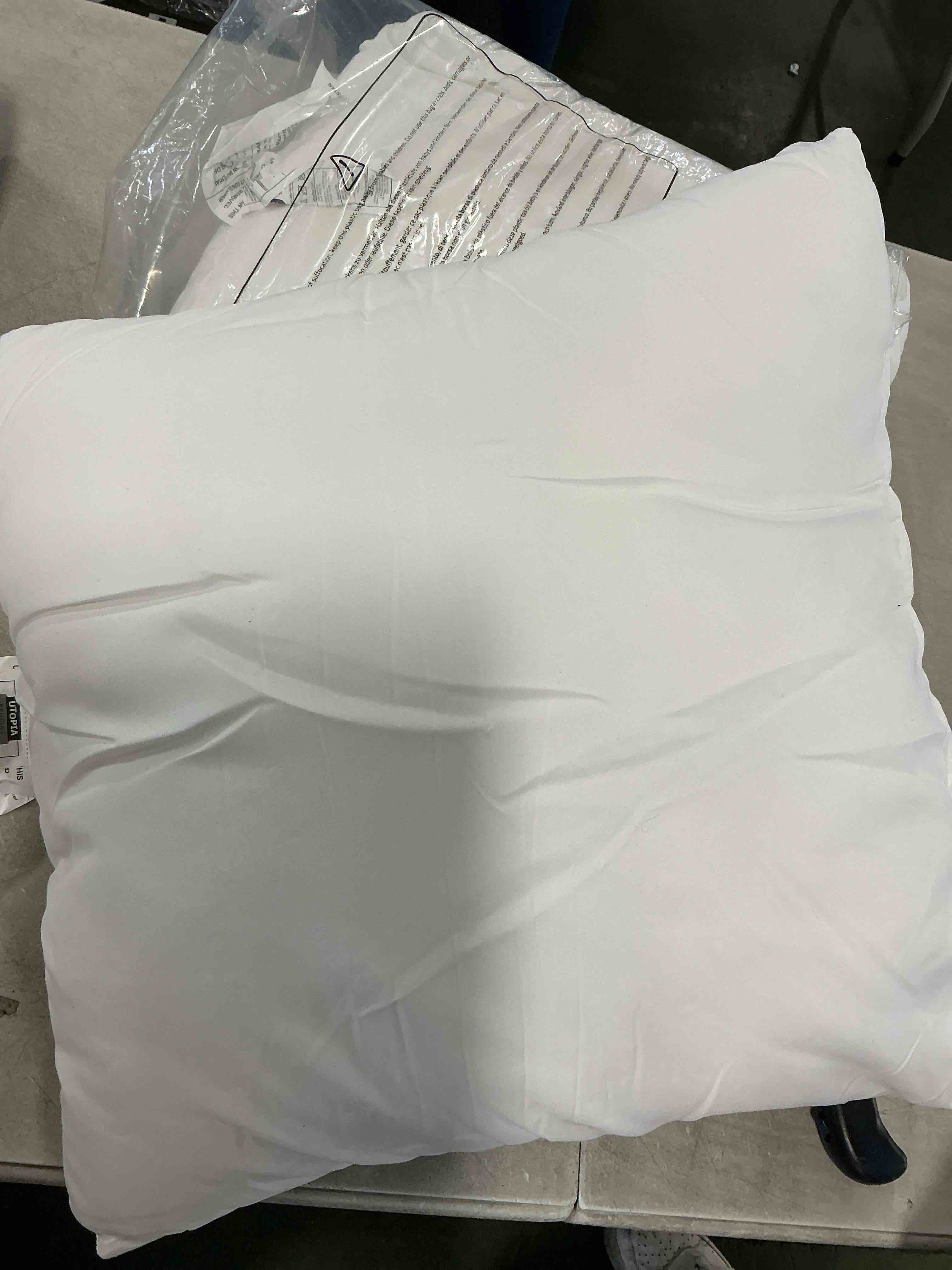 Condition photo showing Good Condition for Utopia Bedding 18x18 Pillow Inserts, Set of 2, White – Indoor Decorative Throw Pillows for Bed, Sofa & Couch – Soft, Supportive & Fluffy Cushion Inserts White 18x18 Inch