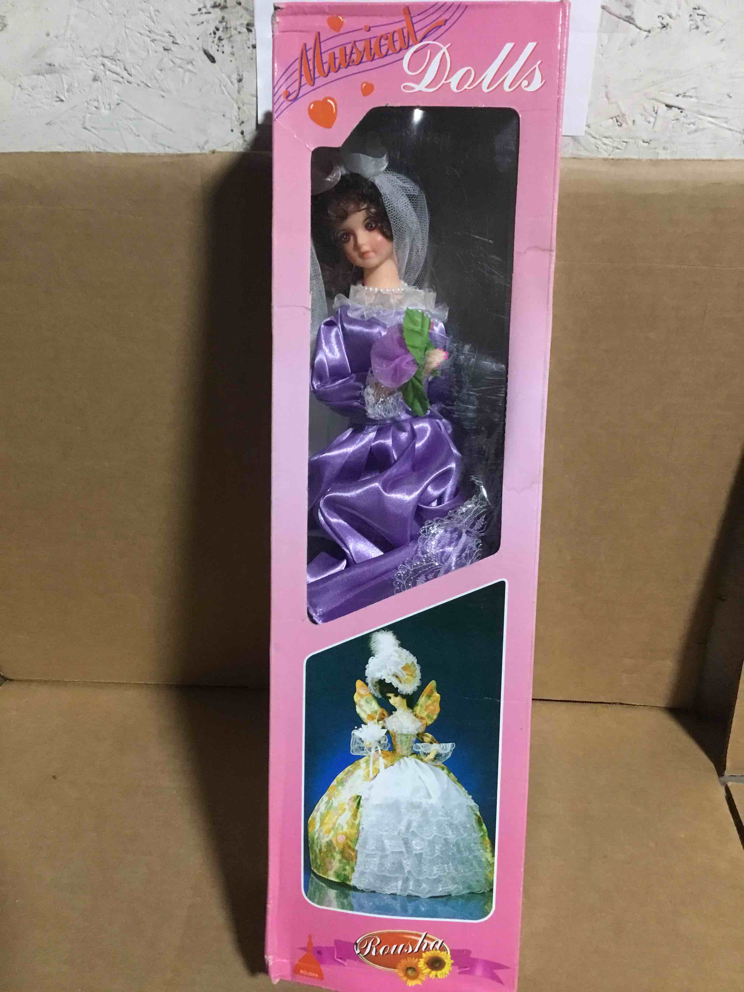 Condition photo showing New/Like New for Musical Doll ROUSHA