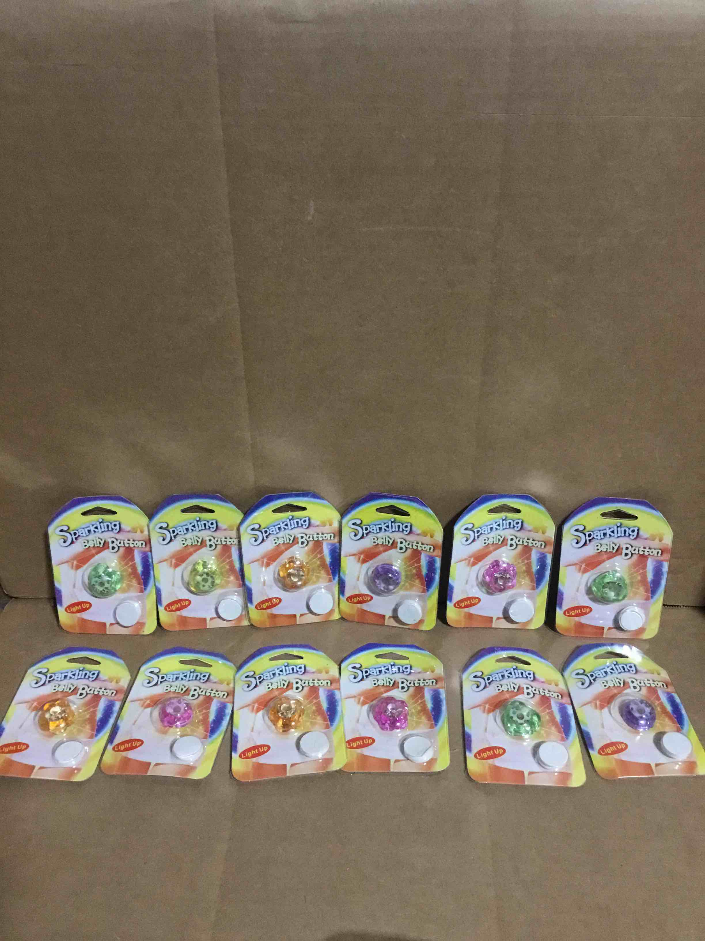 Condition photo showing New/Like New for Pack of 12 Sparkling Belly Button, Light Up