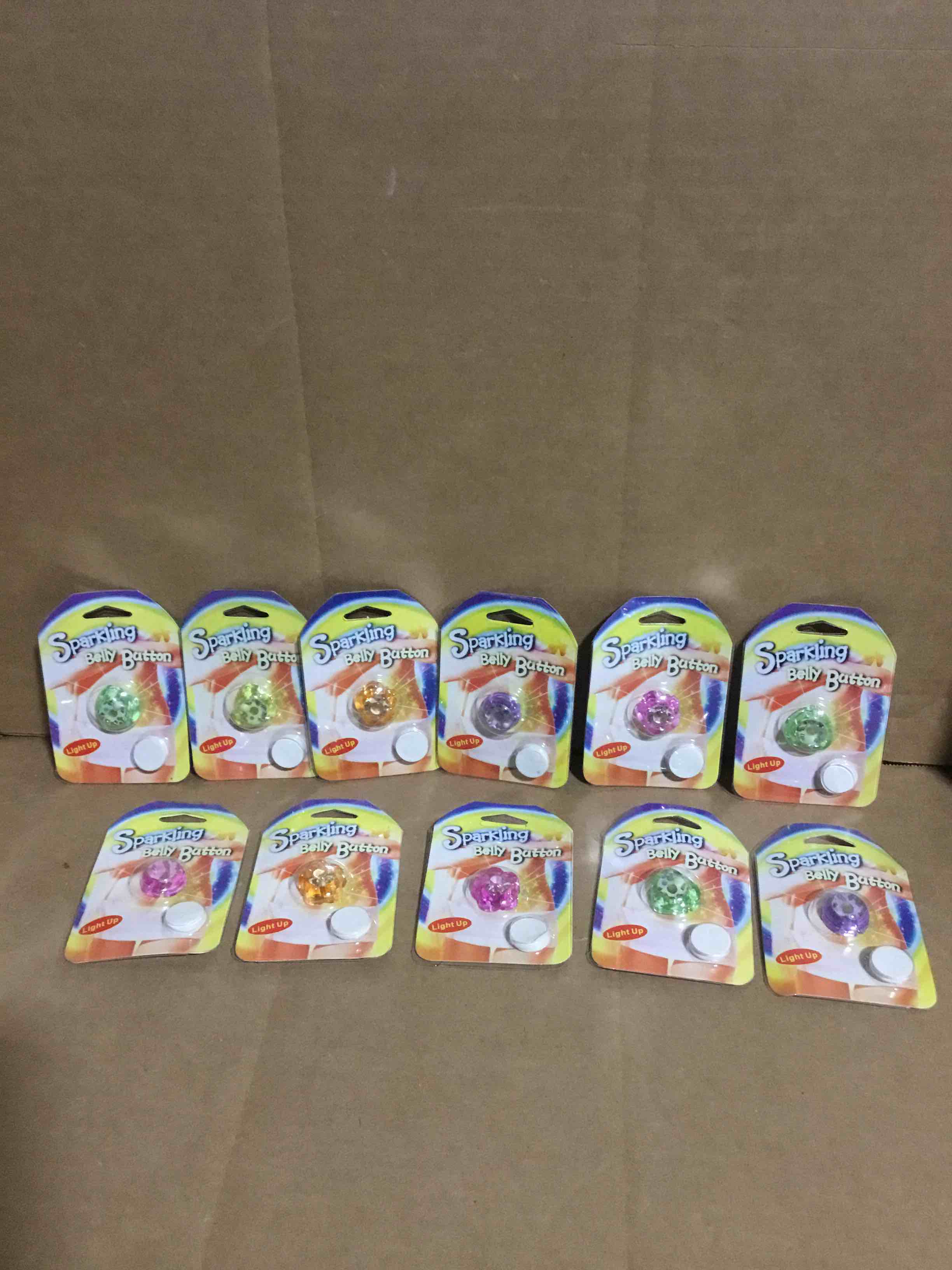 Pack of 11 Sparkling Belly Button, Light Up