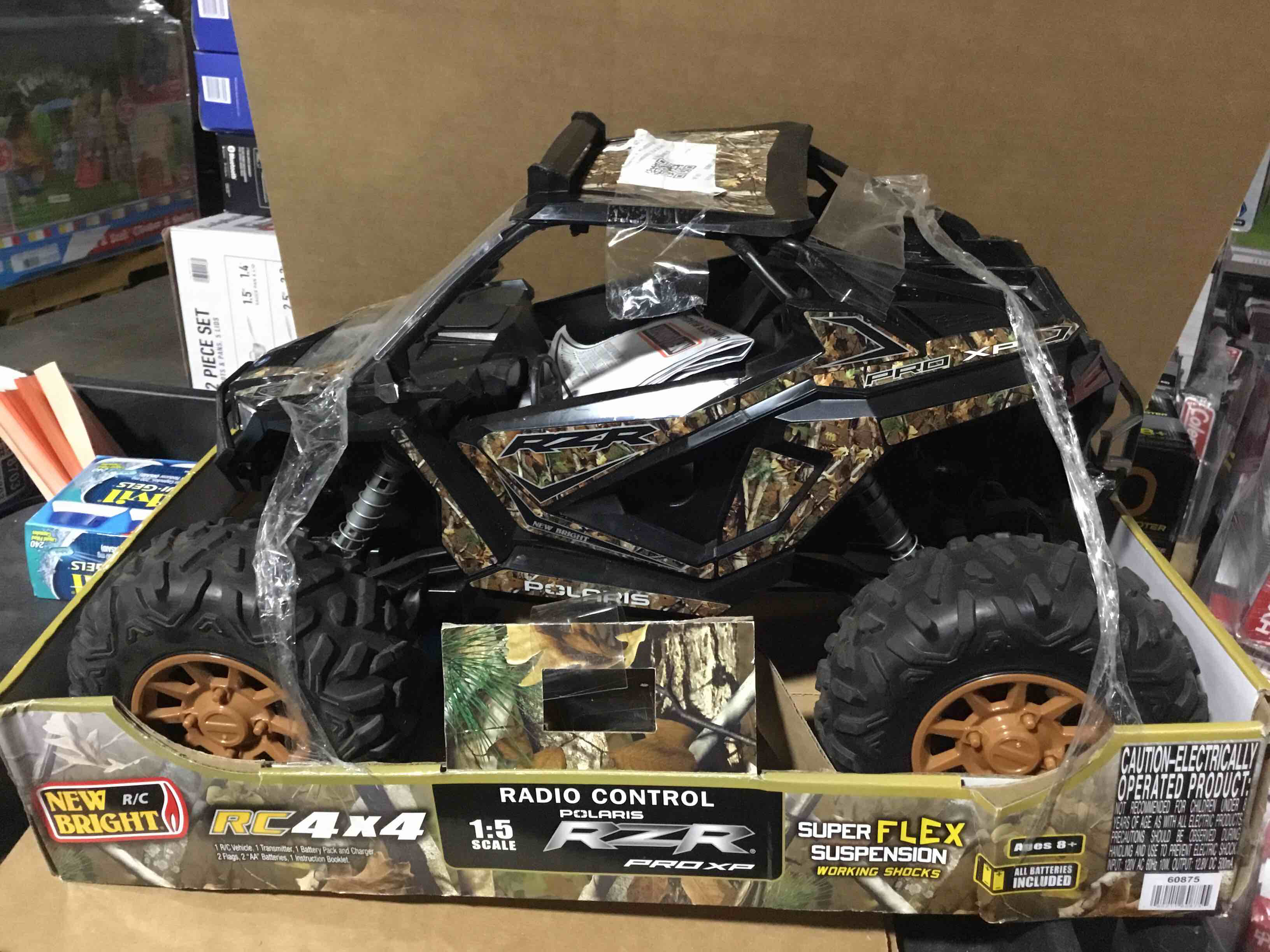 Condition photo showing As Is for New Bright (1:5) Polaris RZR XP Pro 12.8V Battery Remote Control Camo ATV 2.4GHz  60875U Child