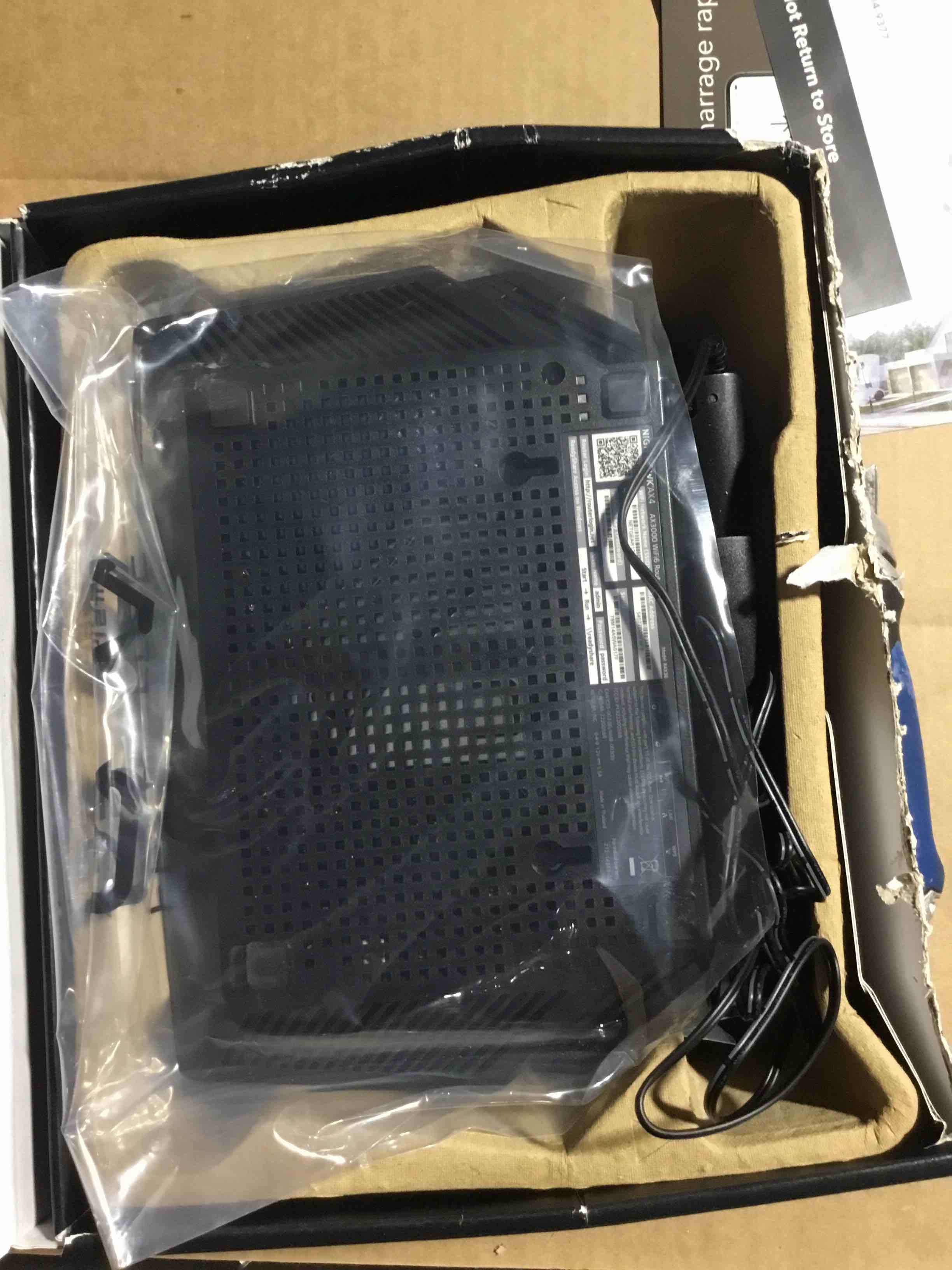 Condition photo showing New/Like New for Netgear AX3000 WiFi 6 Router: Dual Band, Ethernet, 2.4/5 GHz, Includes Power Adapter