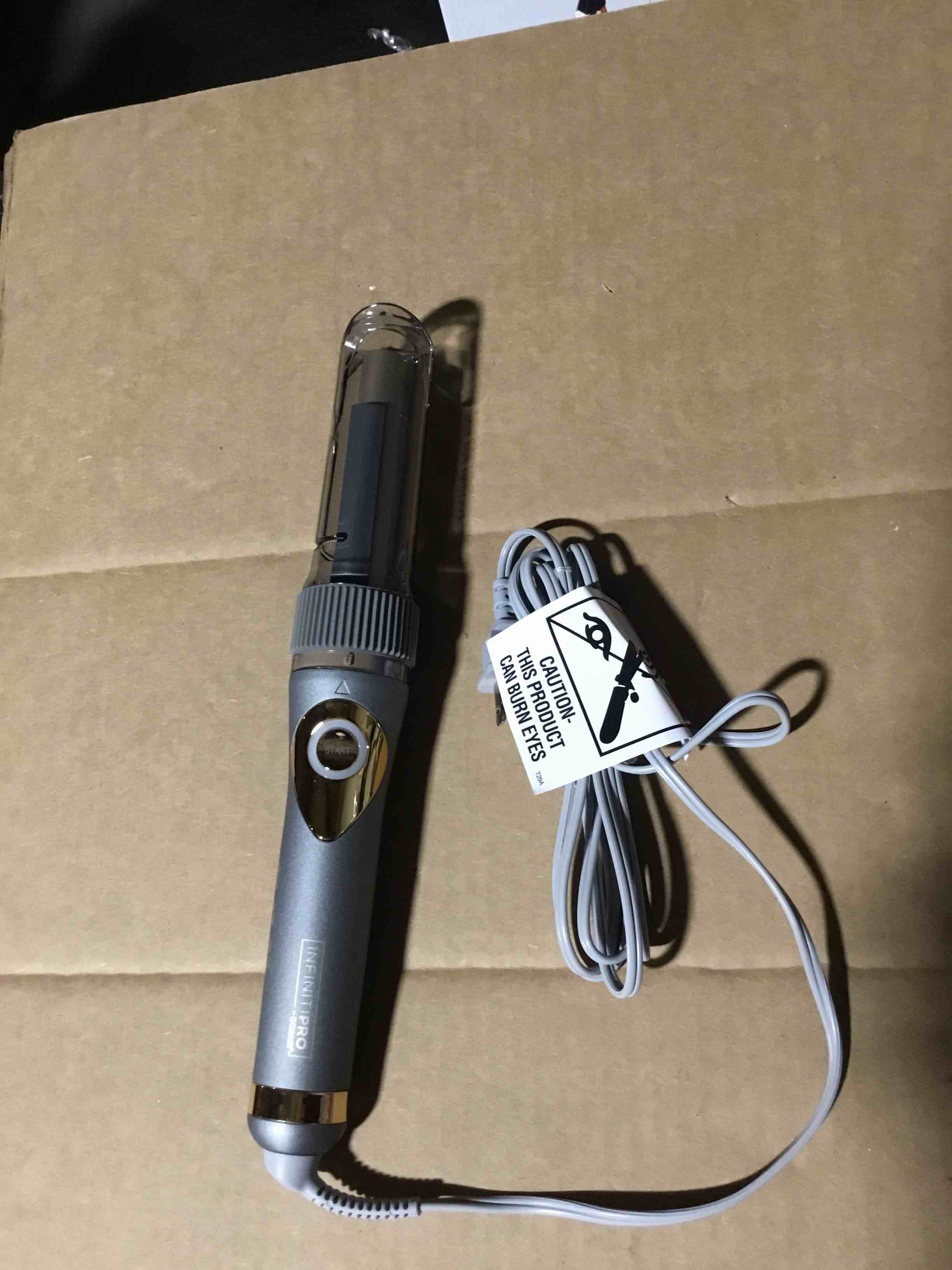 Condition photo showing New/Like New for Conair - InfinitiPRO Curl Secret 2.0 Ceramic Curling Iron - Gray