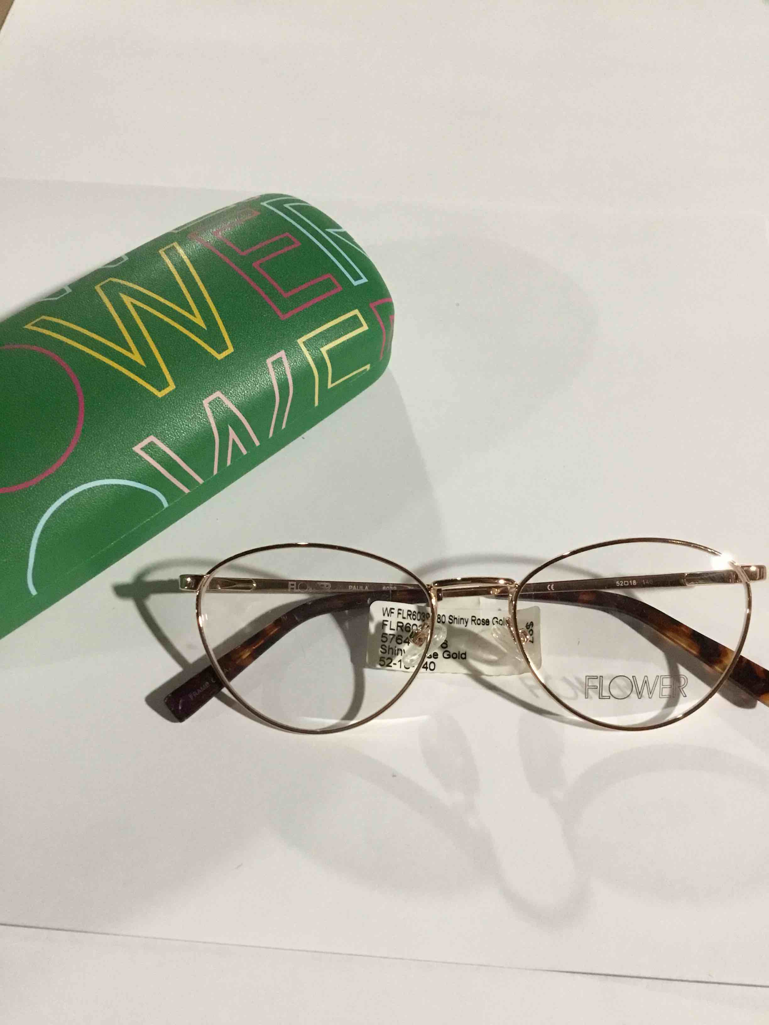 Condition photo showing New/Like New for Flower Women's FLR6039 Prescription Eyeglasses with Case, Rose Gold