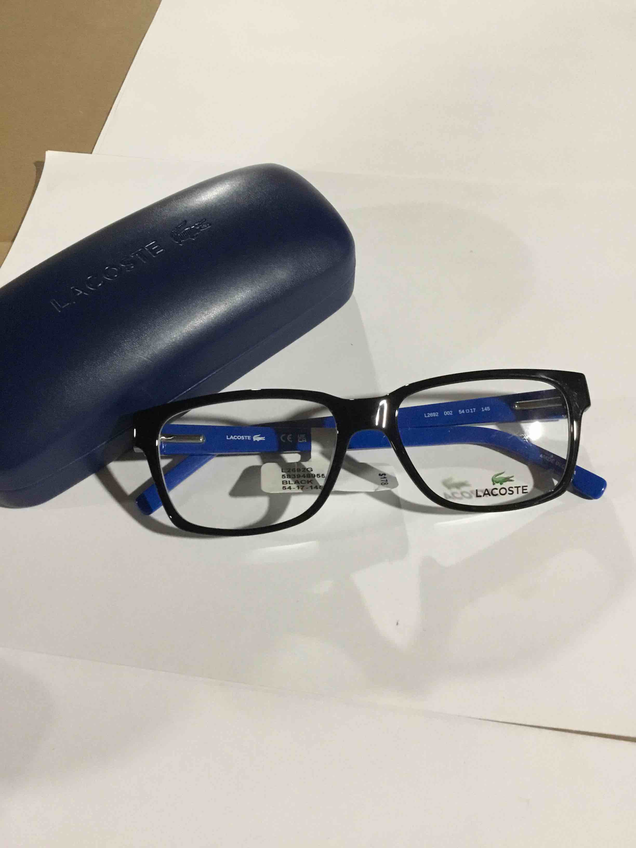 Condition photo showing New/Like New for Lacoste L2692G, Black