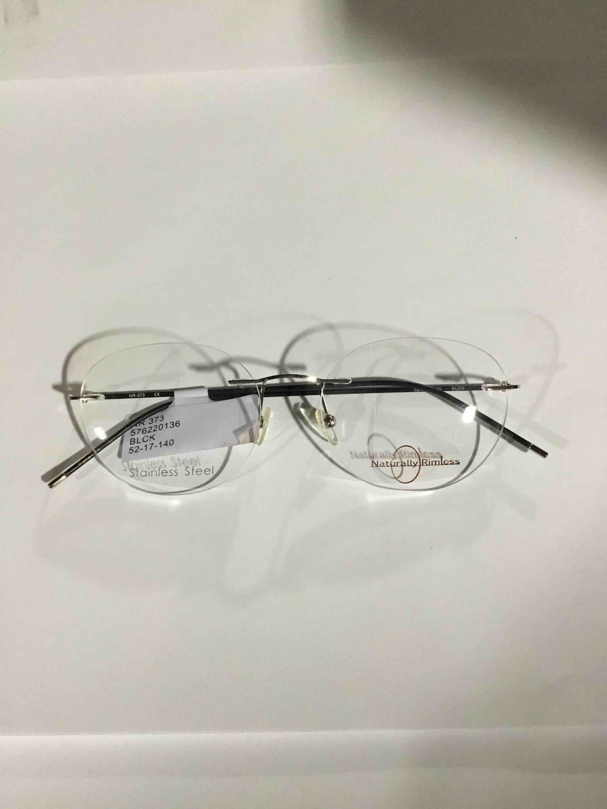 Condition photo showing New/Like New for Naturally Rimless NR-373 Eyeglasses Frame Womens Gunmetal Rimless Oval 52-17-140