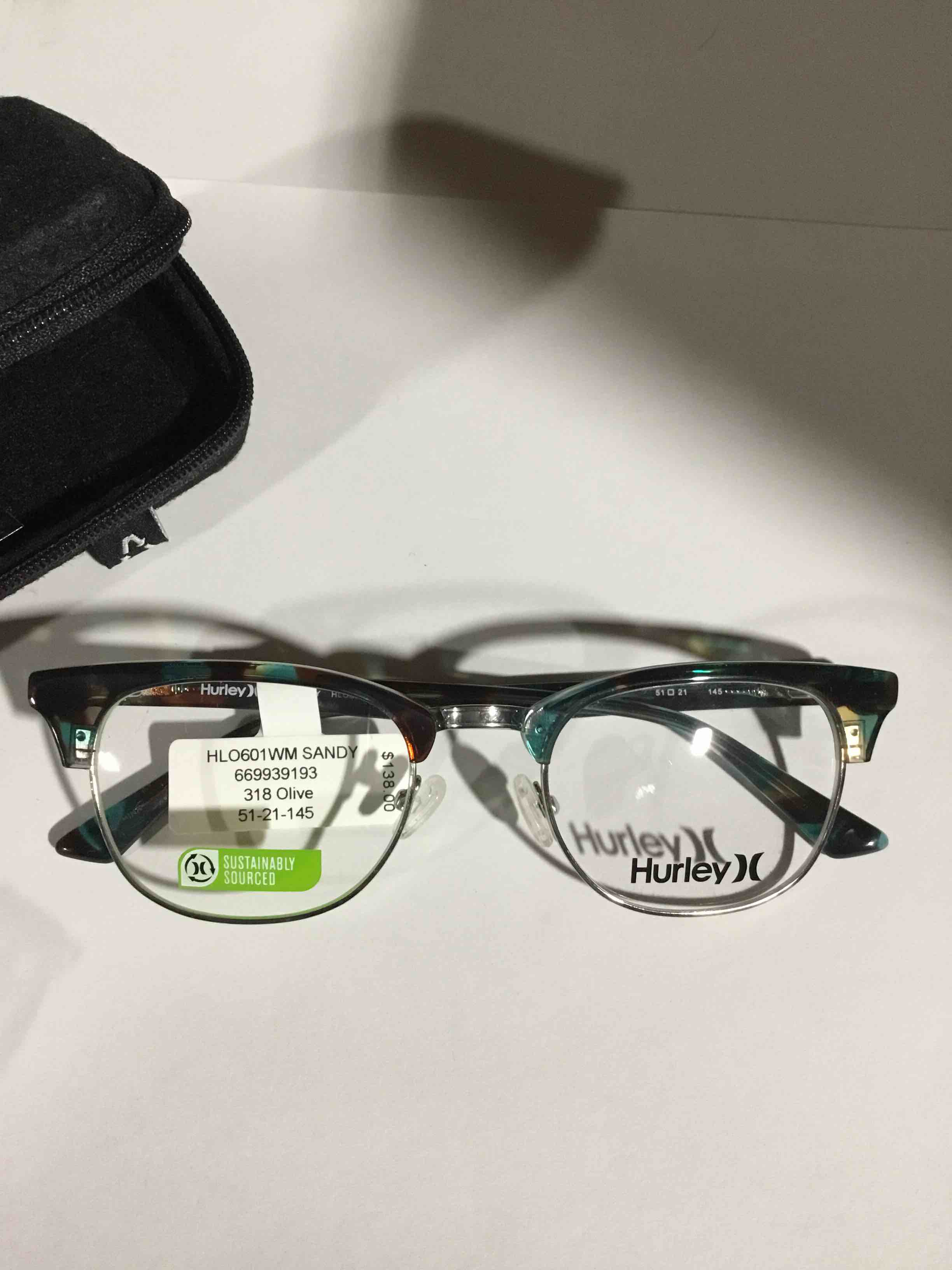Condition photo showing New/Like New for Hurley Women's Sandy Prescription Eyeglasses with Case, Blue Tortoise 