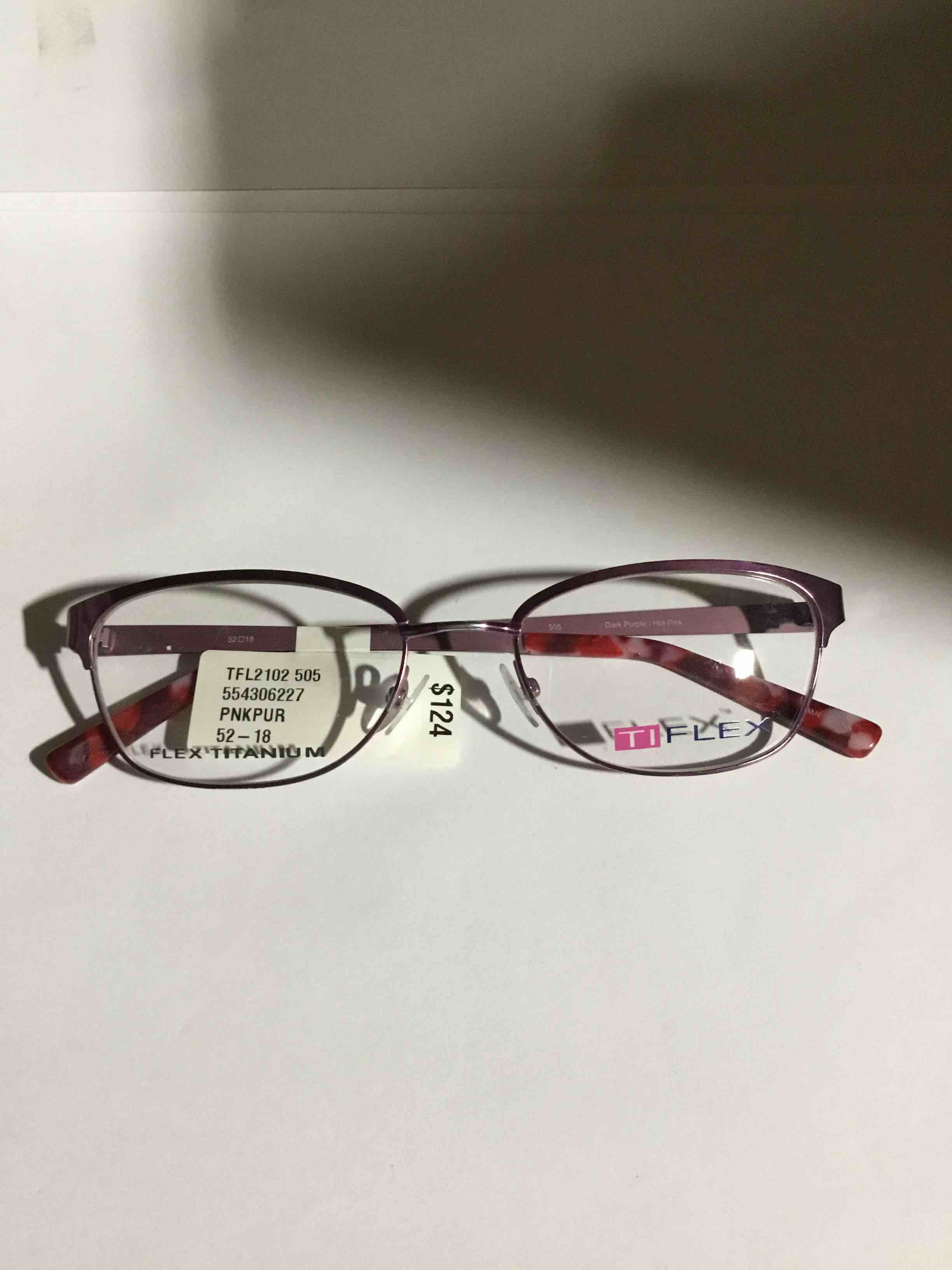 Condition photo showing New/Like New for TiFlex Women's TFL2102 Oval Oval Prescription Eyeglasses with Case, Purple/Pink