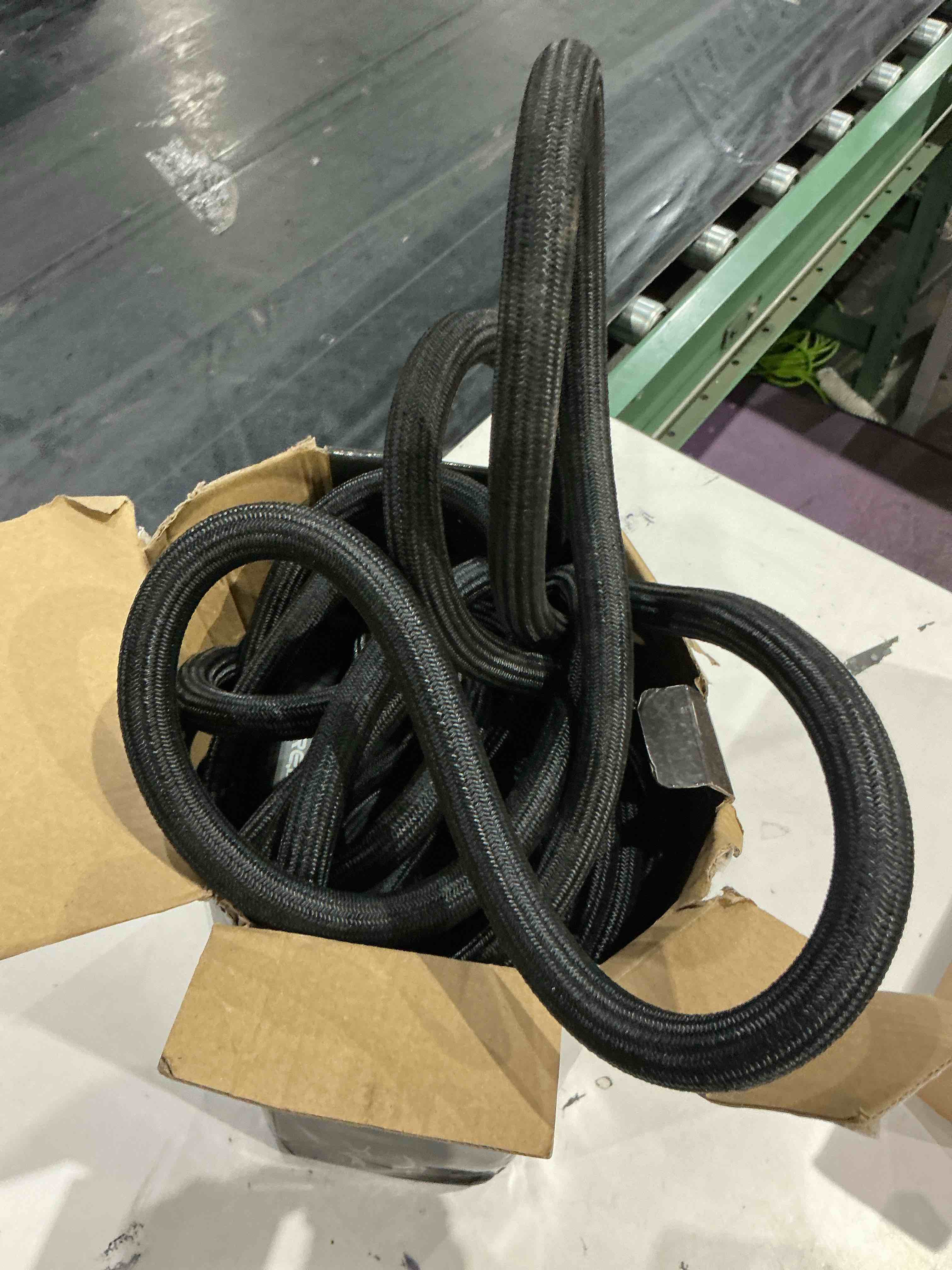 Condition photo showing As Is for relxitl garden hose, flexible water hose, ultra lightweight non-expanding hose with 10 function sprayer, leak proof, pressure resistant for yard, outdoor (black, 50ft) 50ft black