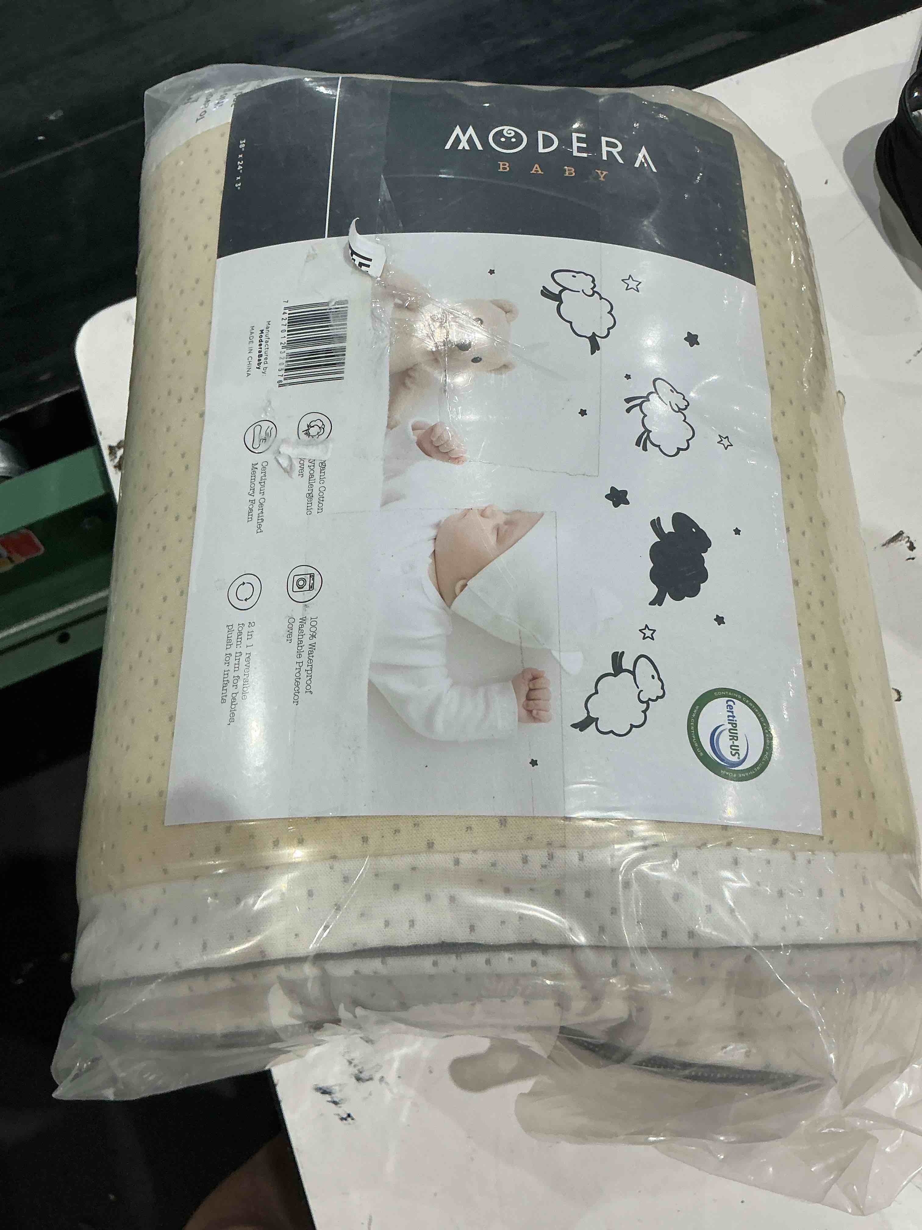 Condition photo showing As Is for modera baby mini crib mattress mod-mocm 38x24x3” reversible memory foam