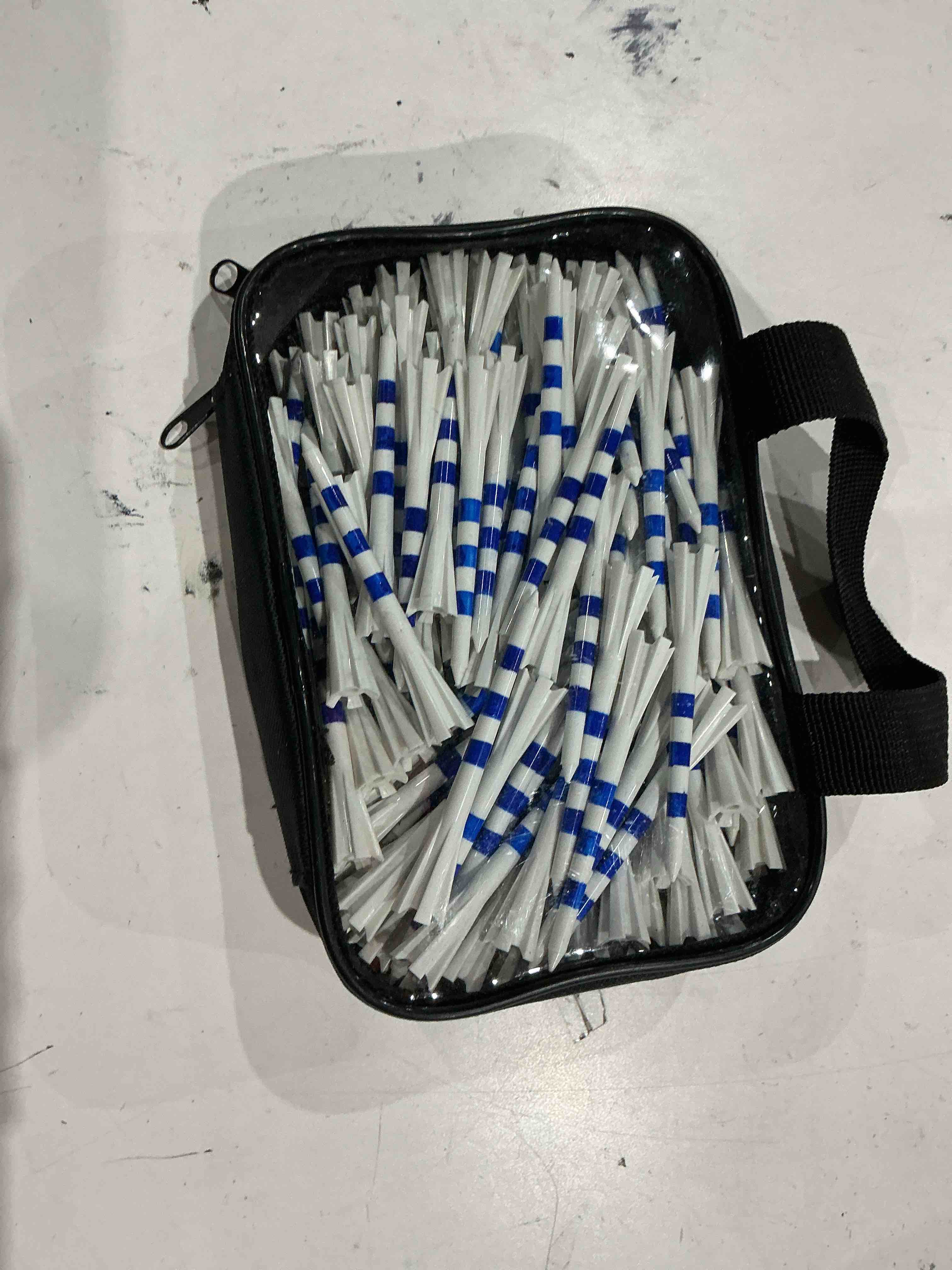 Condition photo showing As Is for noastore 3 ¼” golf tees plastic – white/blue stripes