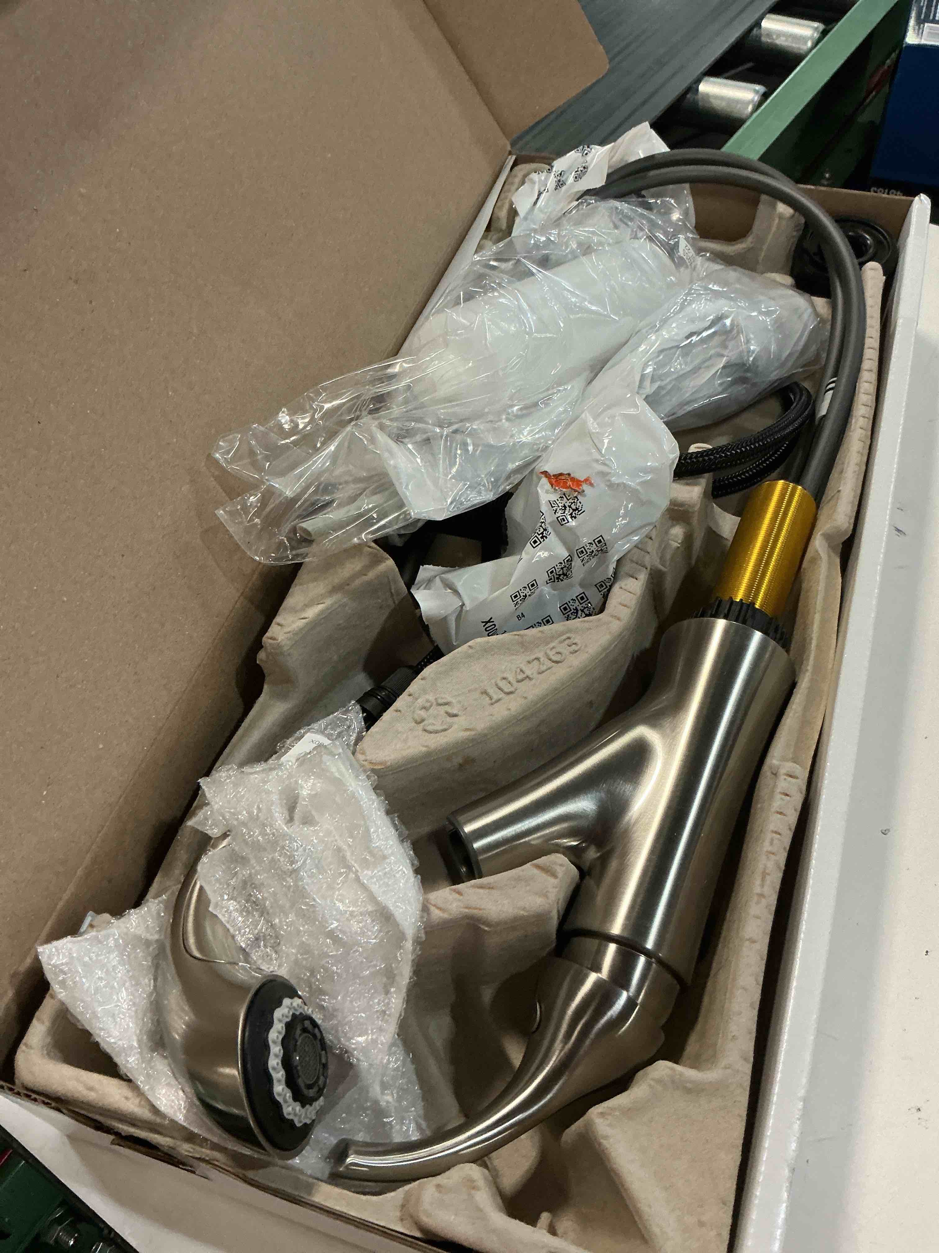 Condition photo showing As Is for delta kessler stainless 16932-sssd-dst 1-handle deck mount pull-out faucet *read