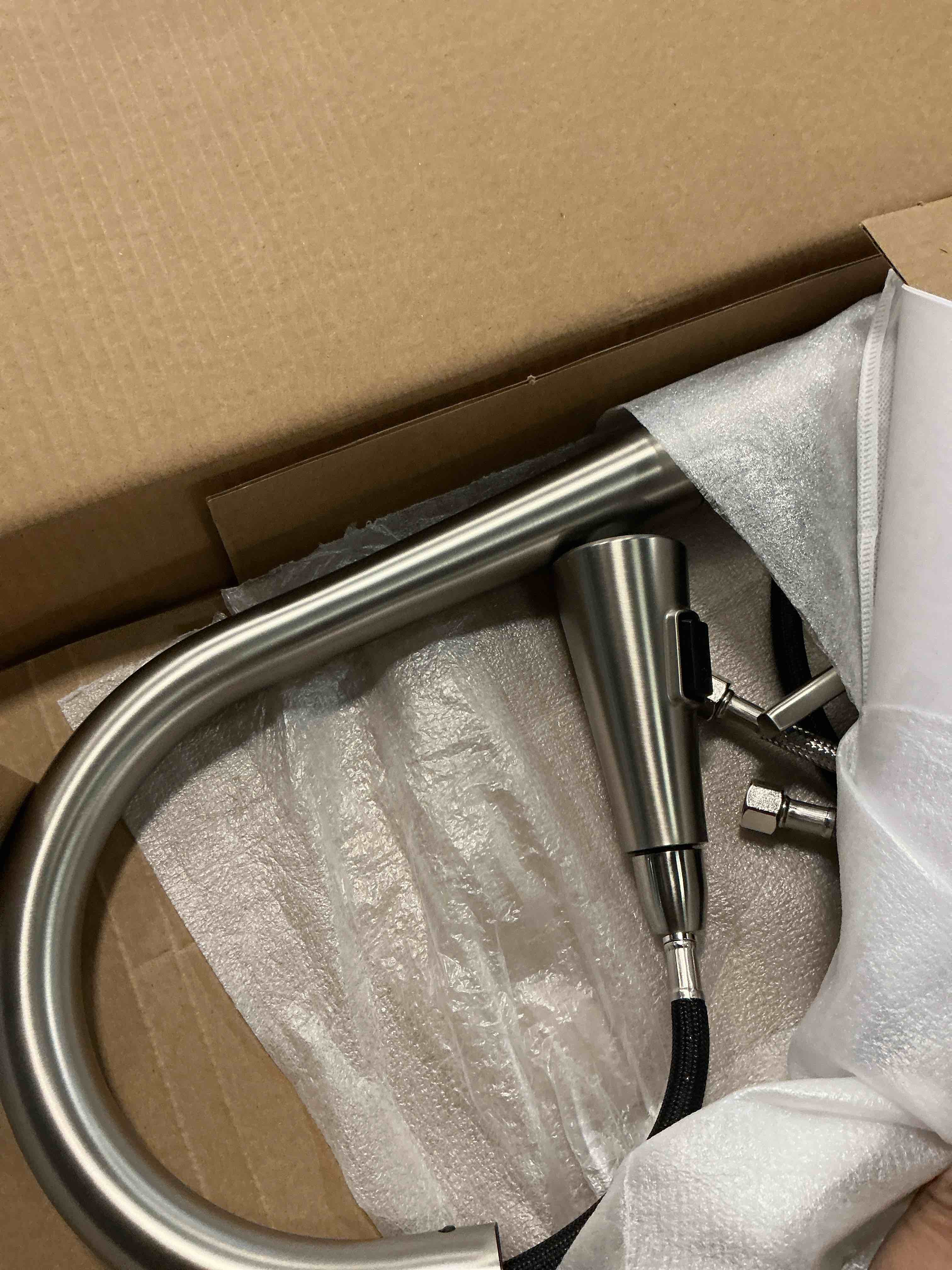 Condition photo showing As Is for merrick stainless steel single handle deck-mount pull-down kitchen faucet with sprayer (includes deck plate)