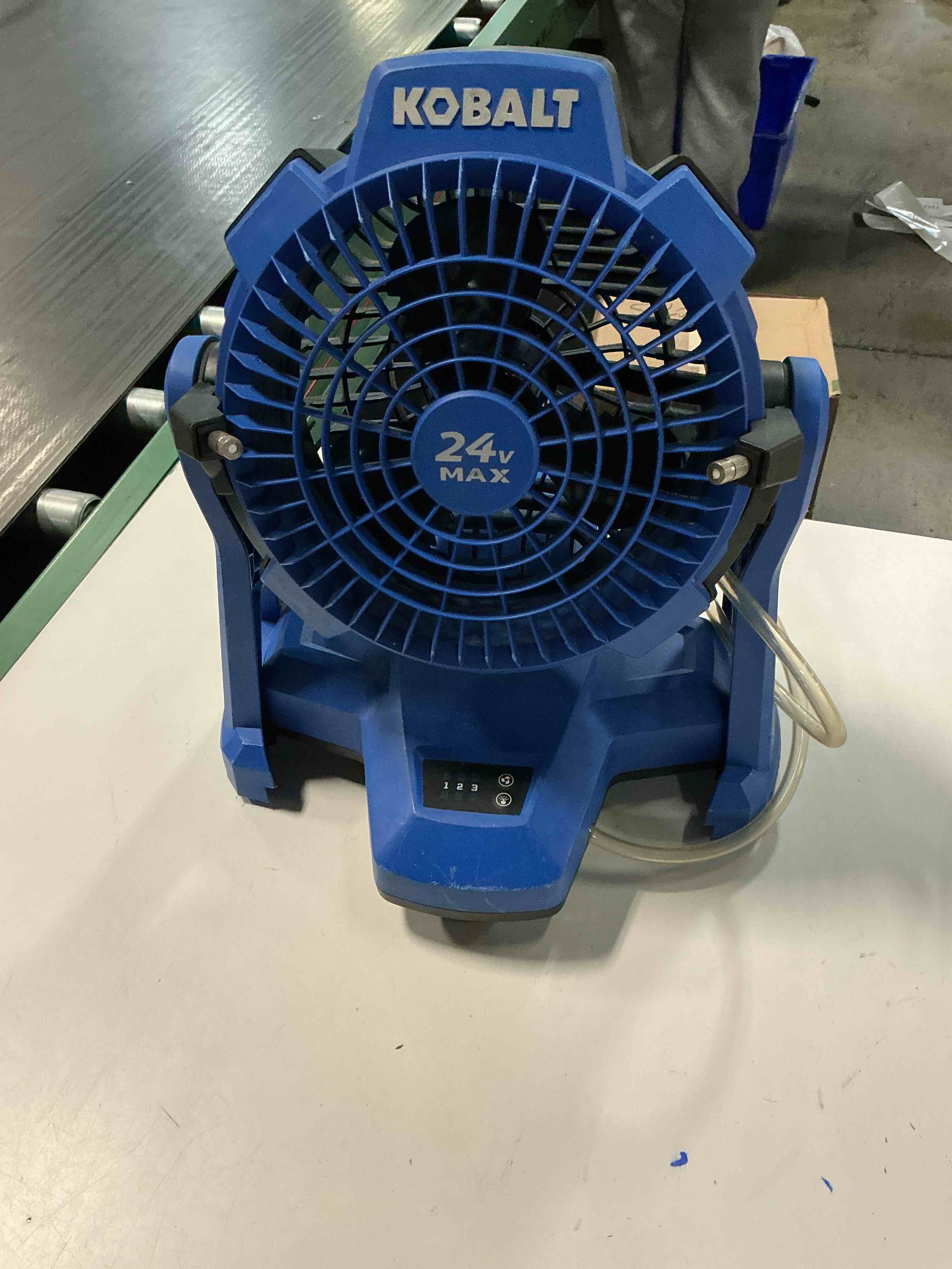 Condition photo showing As Is for kobalt 7-in high velocity indoor/outdoor misting jobsite fan, battery powered, in blue