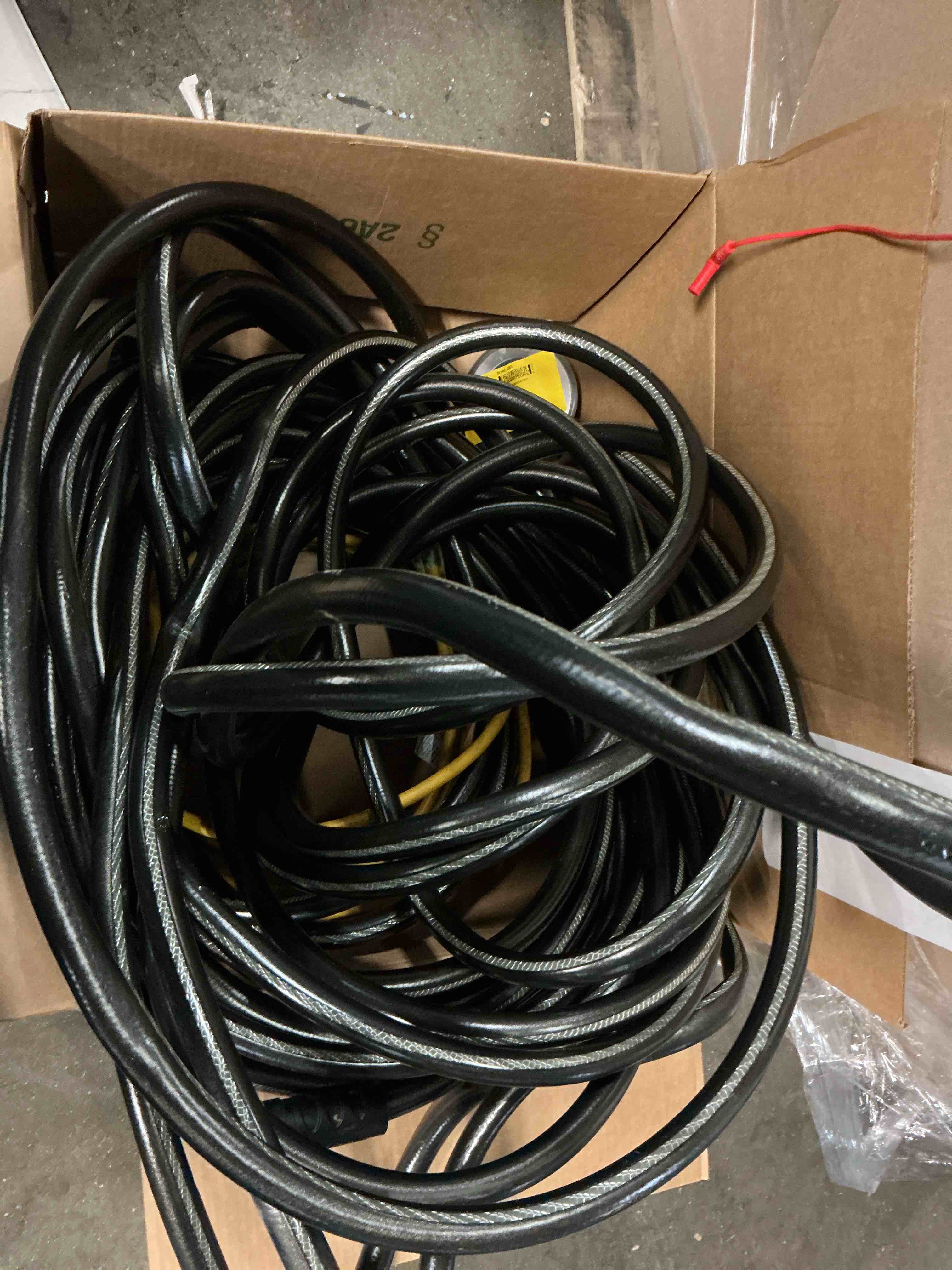 Condition photo showing As Is for neverkink teknor apex 5/8-in x 100-ft heavy -duty kink free vinyl gray coiled hose