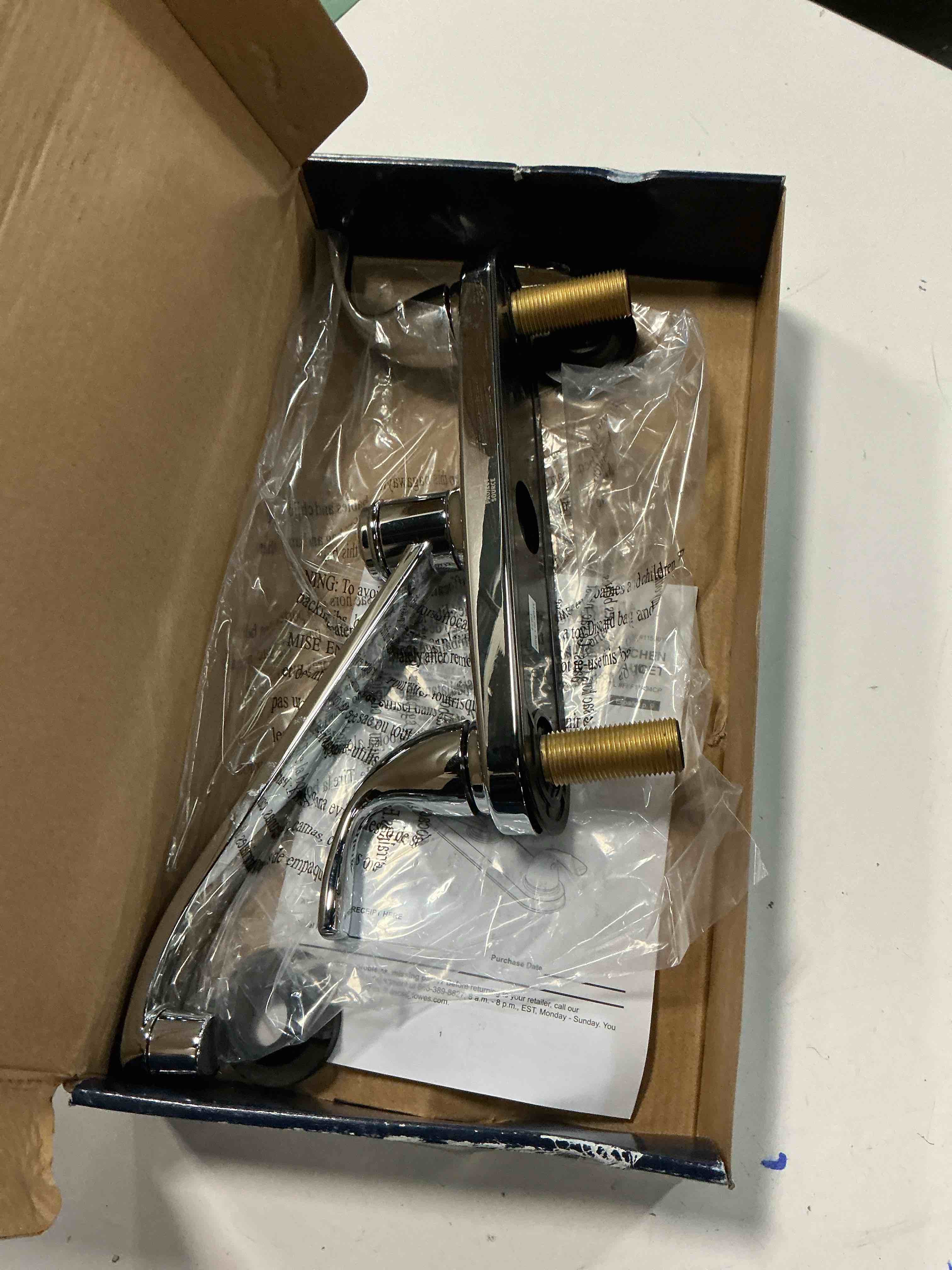 Condition photo showing As Is for project source dover chrome double handle deck-mount kitchen faucet (includes deck plate) 