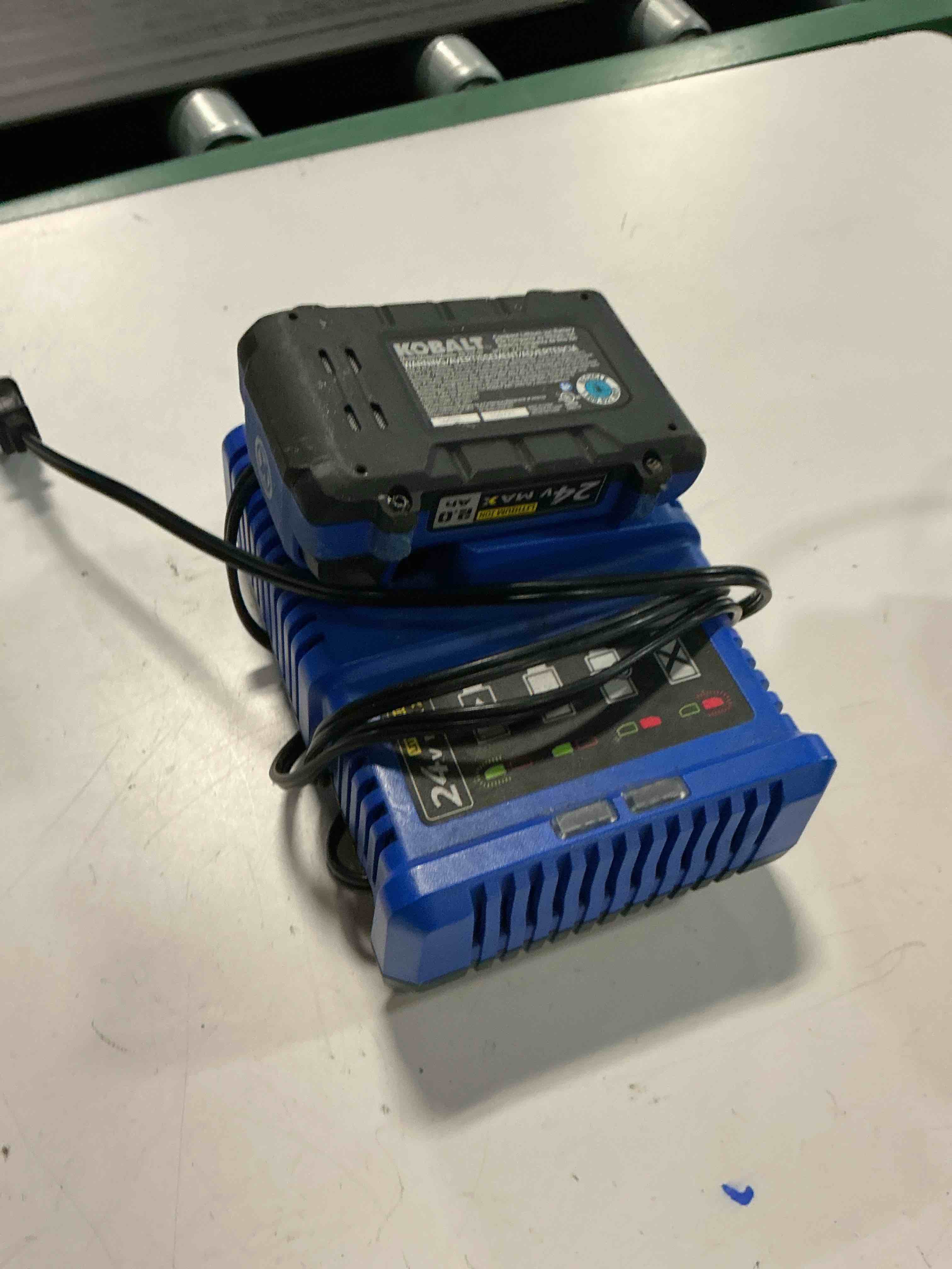 Condition photo showing As Is for kobalt 24 -volt lithium-ion ( battery charger )