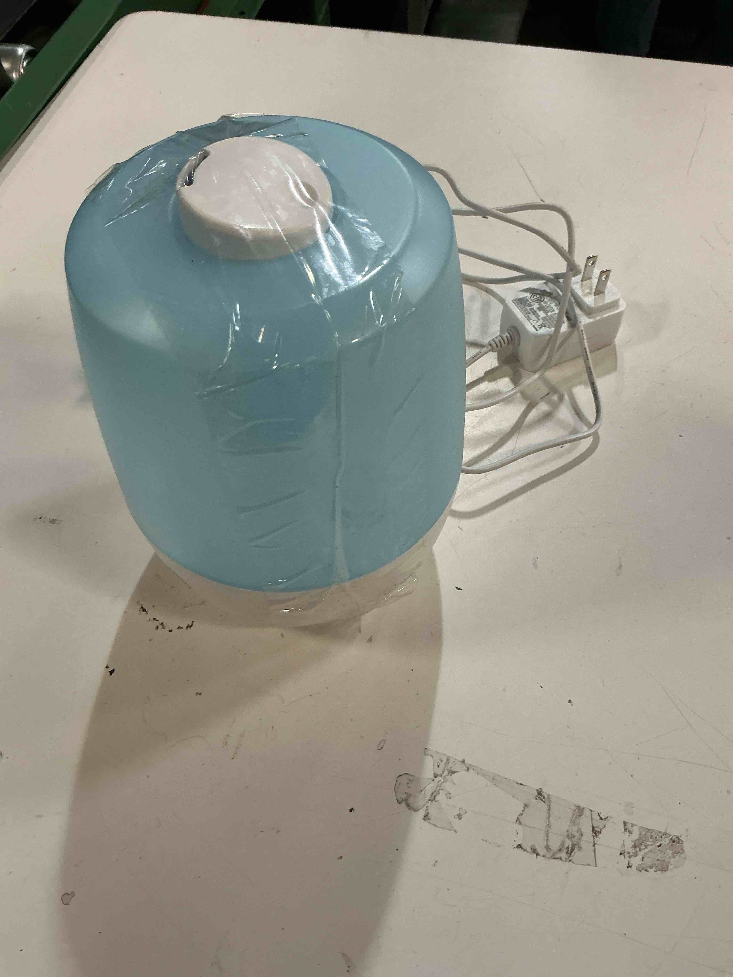 Condition photo showing As Is for safety 1st everyday compact cool mist humidifier, blue