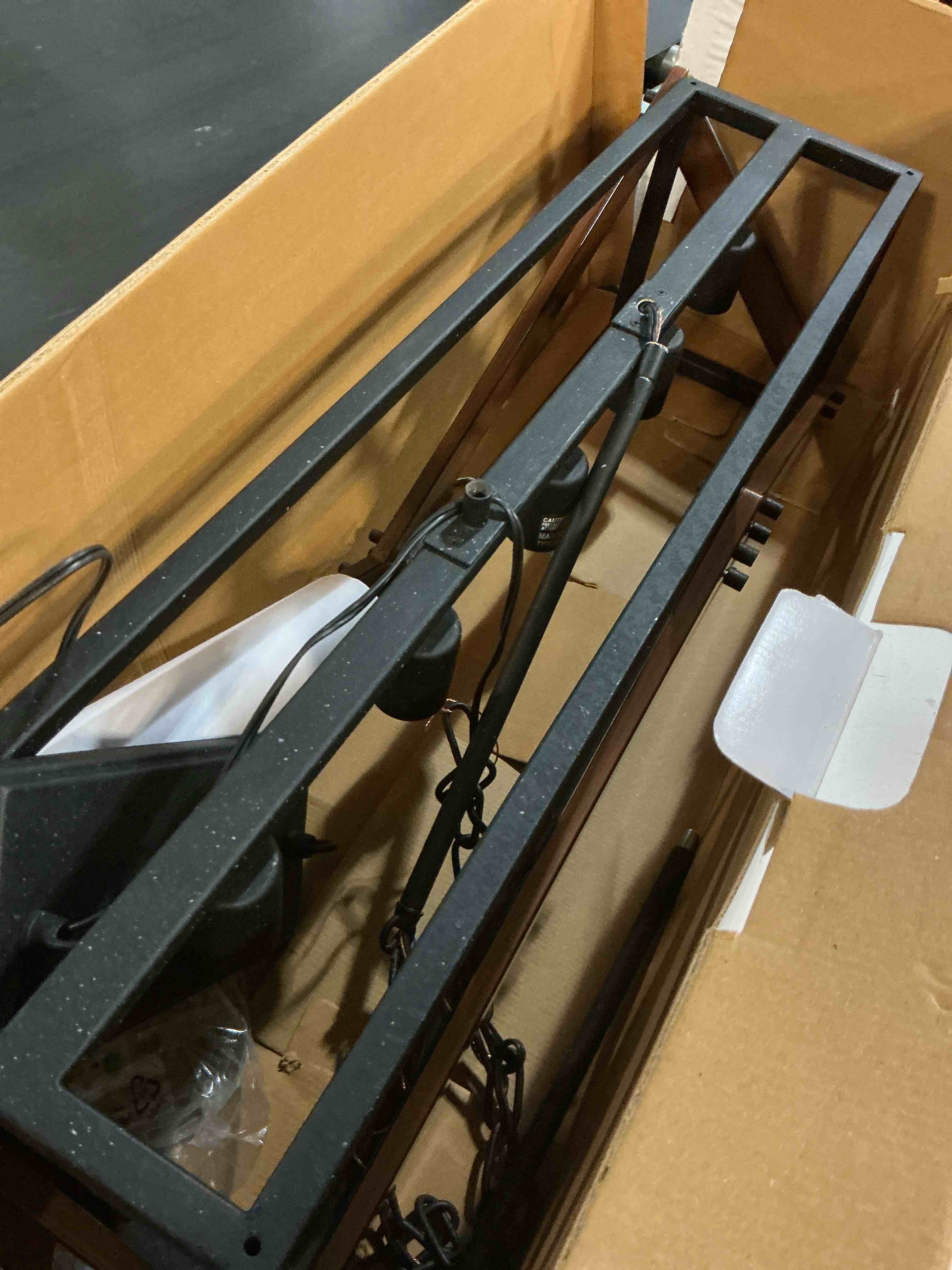 Condition photo showing As Is for 100+ bought last week kichler barrington 5 -light distressed black and wood tone farmhouse cage linear large hanging kitchen island light item #22