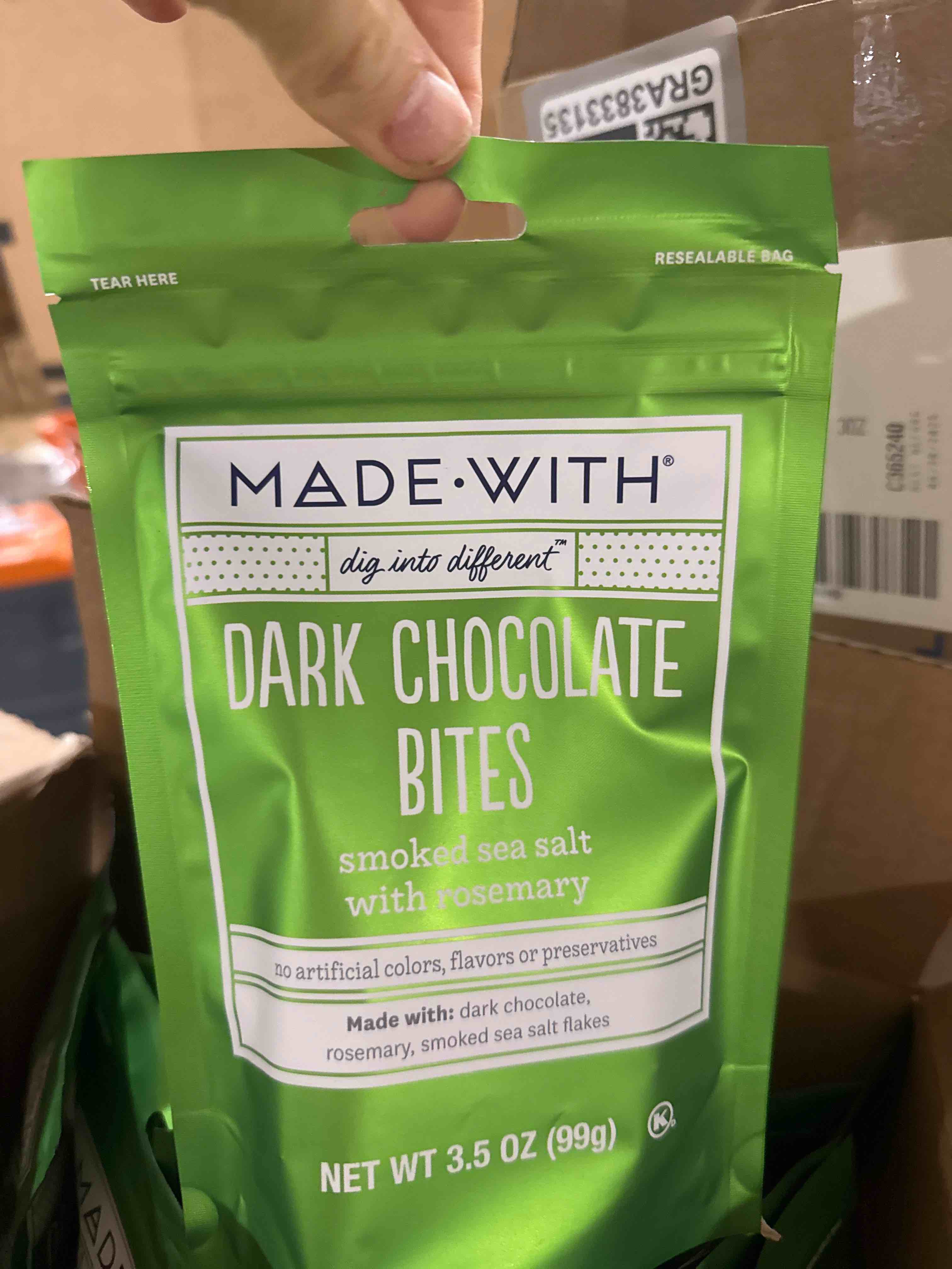 Condition photo showing Brand New for case of eight best buy 2025 made with dark chocolate bites smoked sea salt with rosemary 3.5 ounce bag
