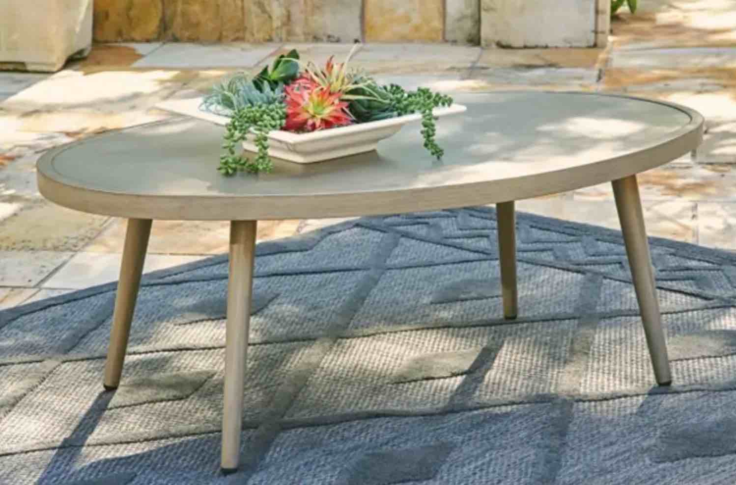 swiss valley oval cocktail table